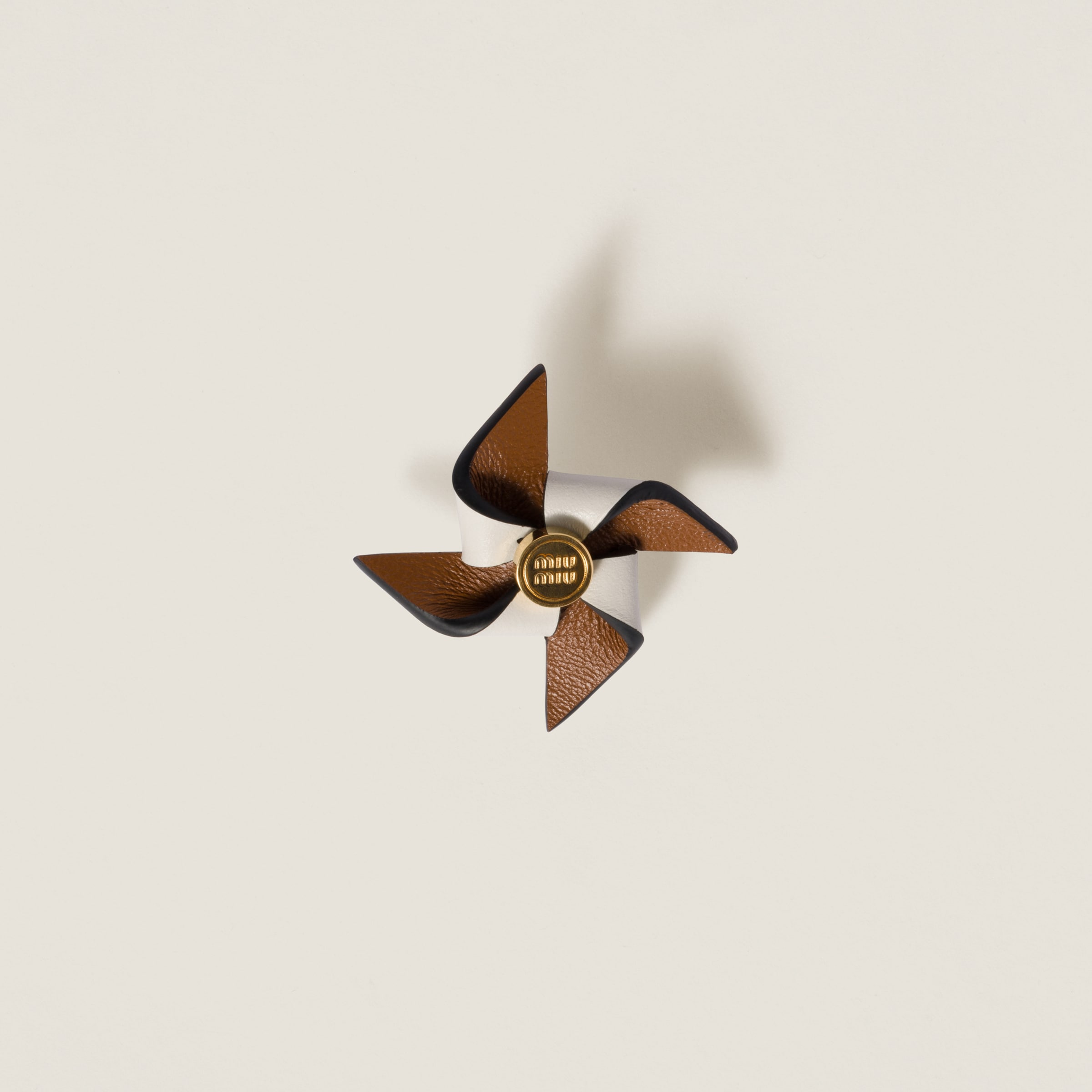 Miu Miu Leather Pinwheel Brooch In Cognac/white