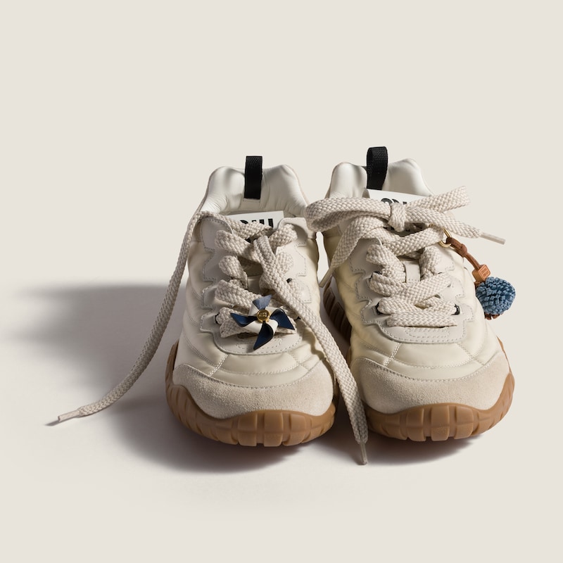 Leather pinwheel brooch