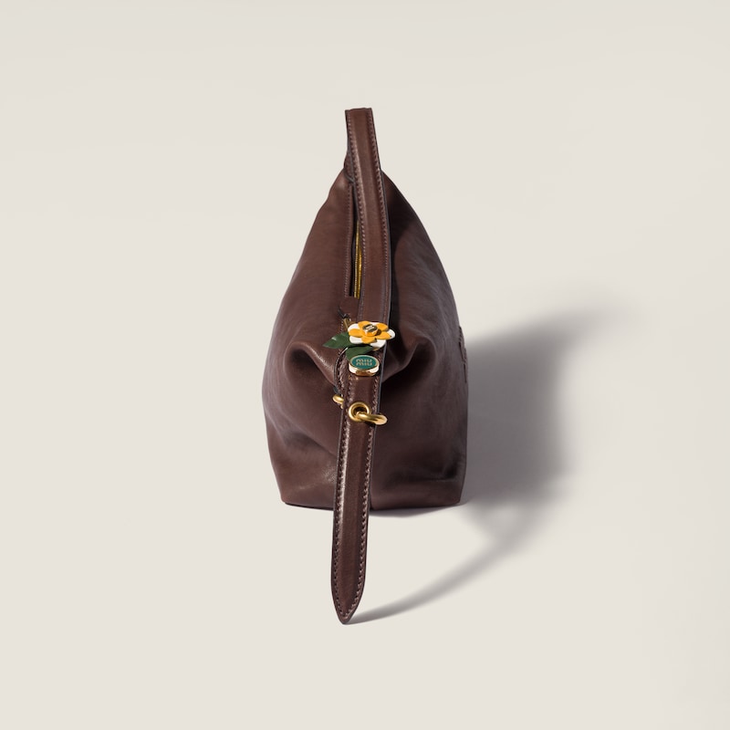 Enameled metal logo brooch