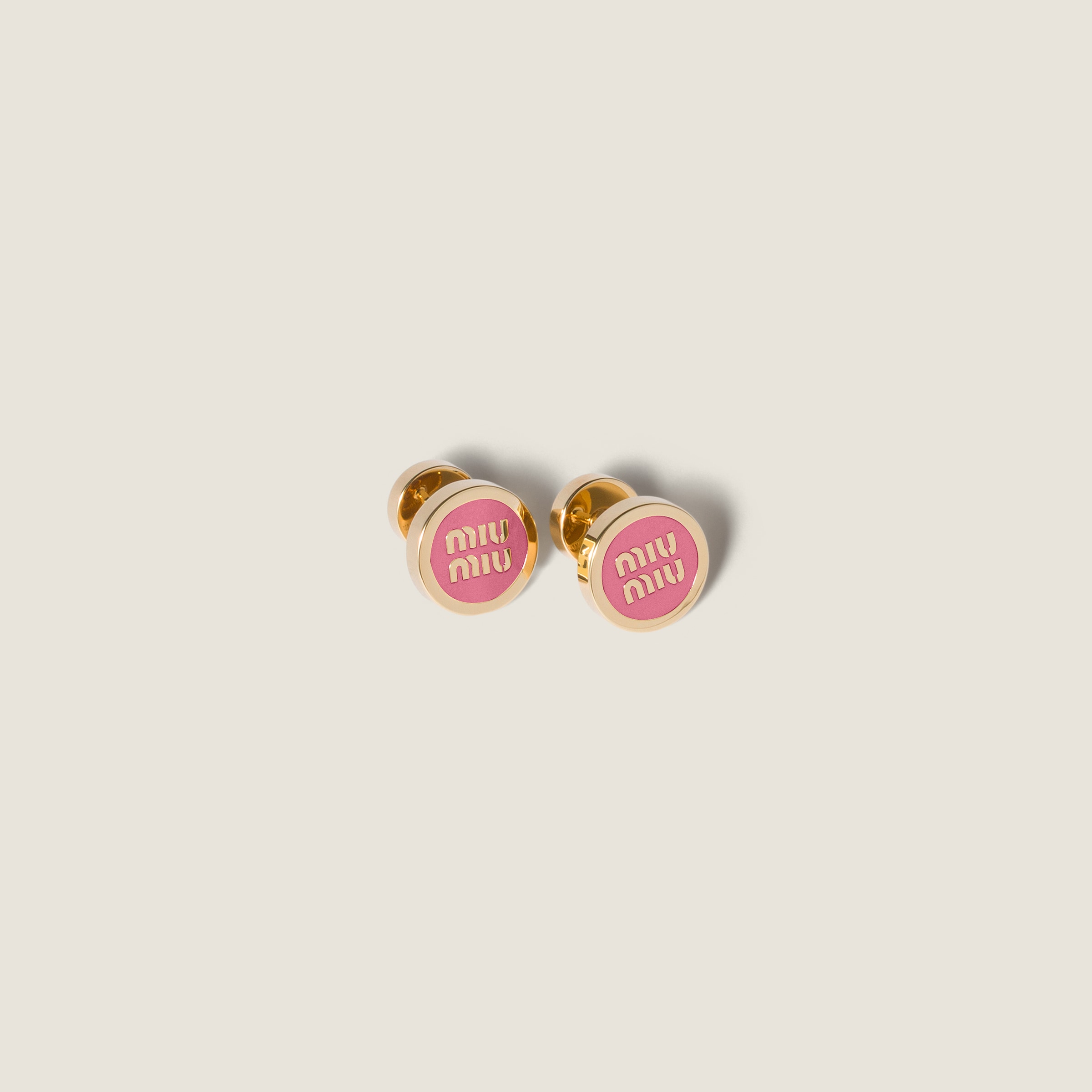 Enameled metal earrings from Miu Miu - $380