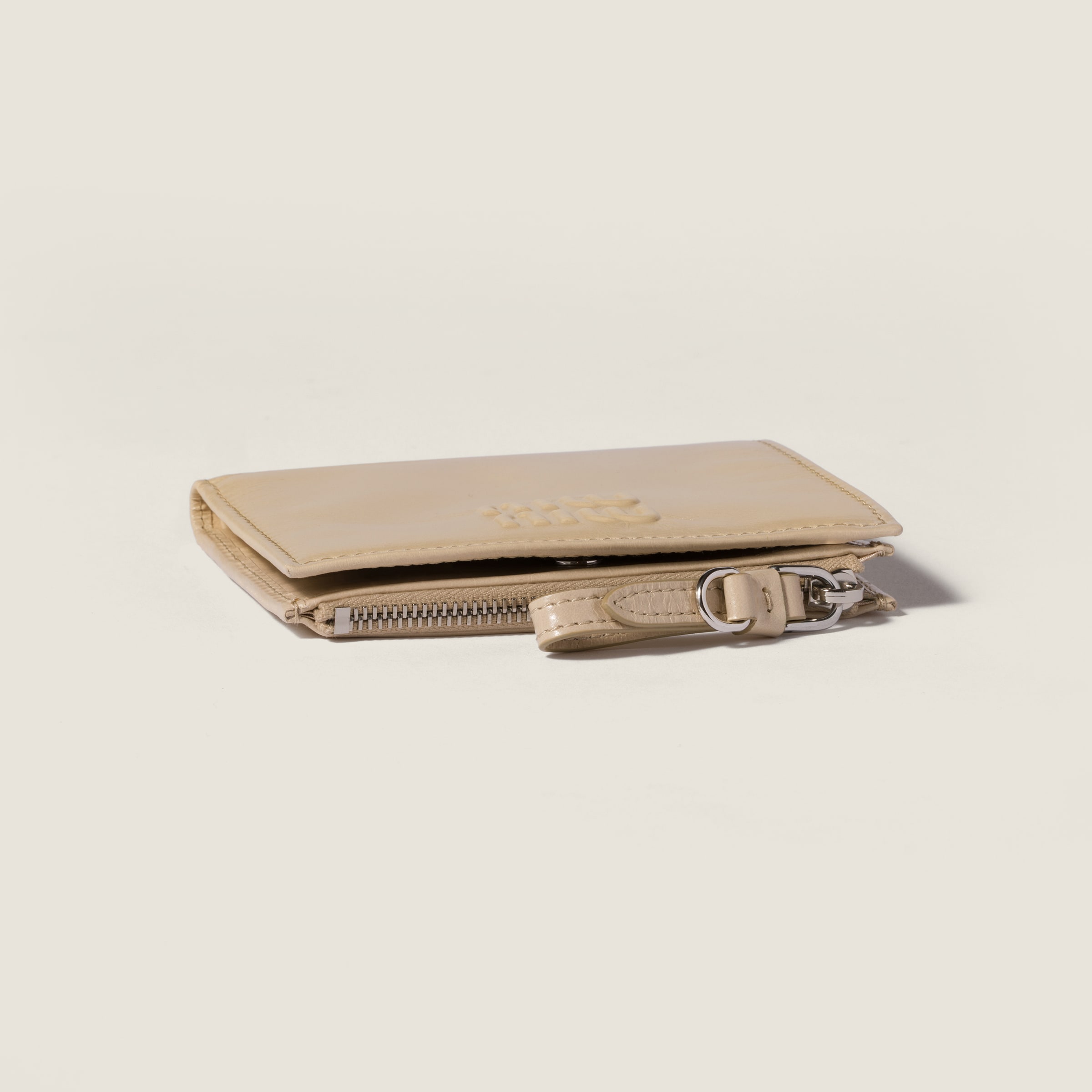 トラバーチンストーン レザー 財布 | Miu Miu - 日本