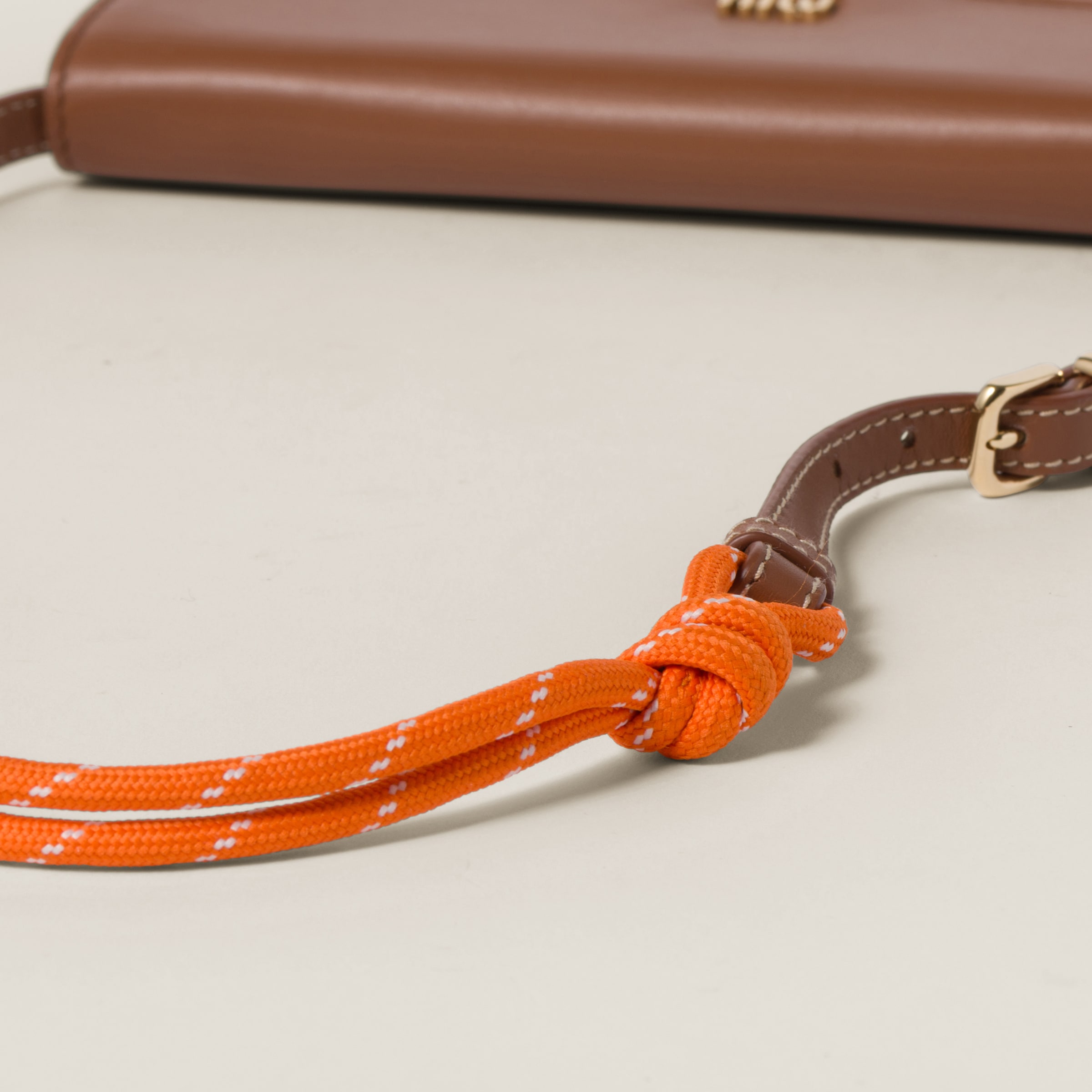 Shop Miumiu Leather Wallet With Leather And Cord Shoulder Strap In Cognac/orange