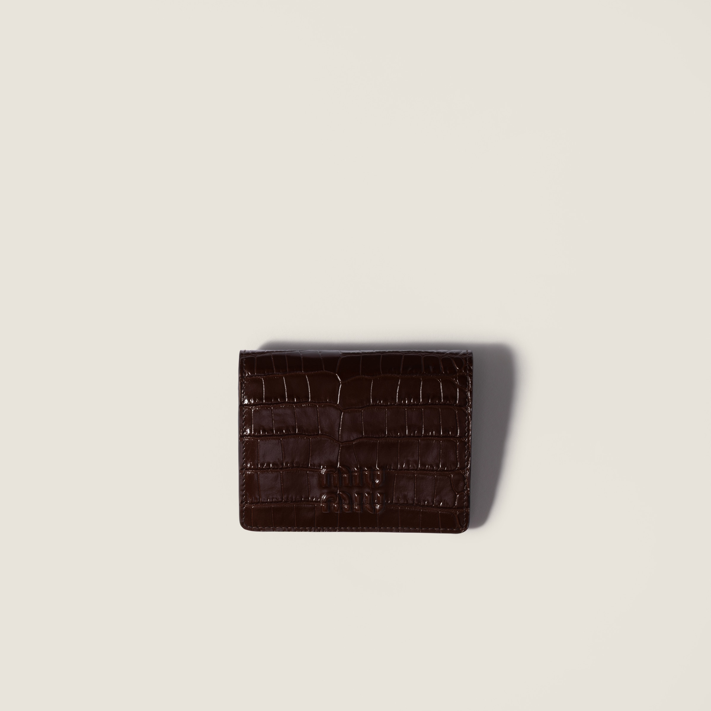 Small crocodile embossed calfskin wallet by Miu Miu