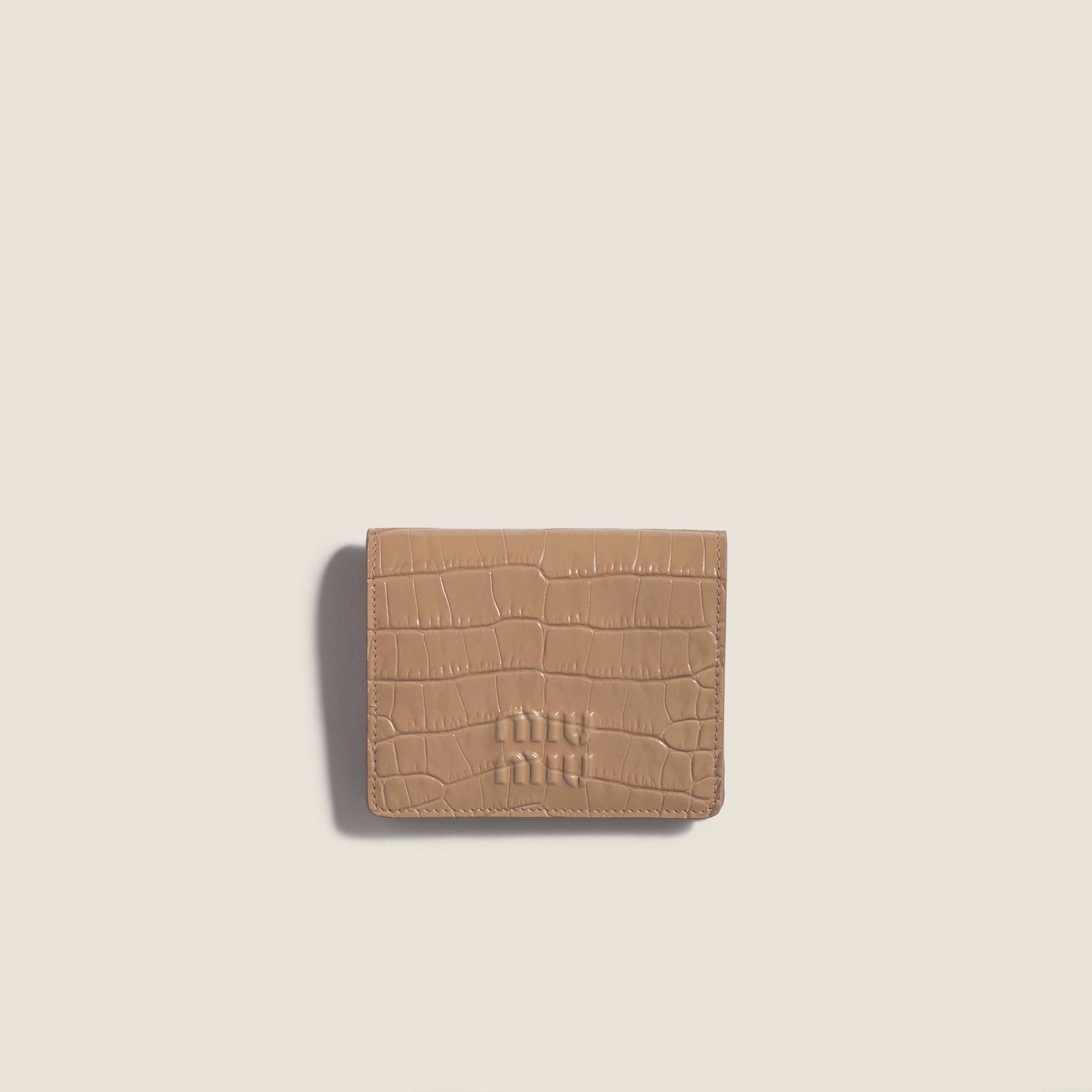 Small crocodile embossed calfskin wallet by Miu Miu