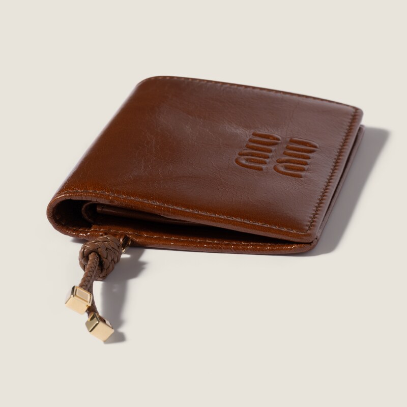Small shiny leather wallet