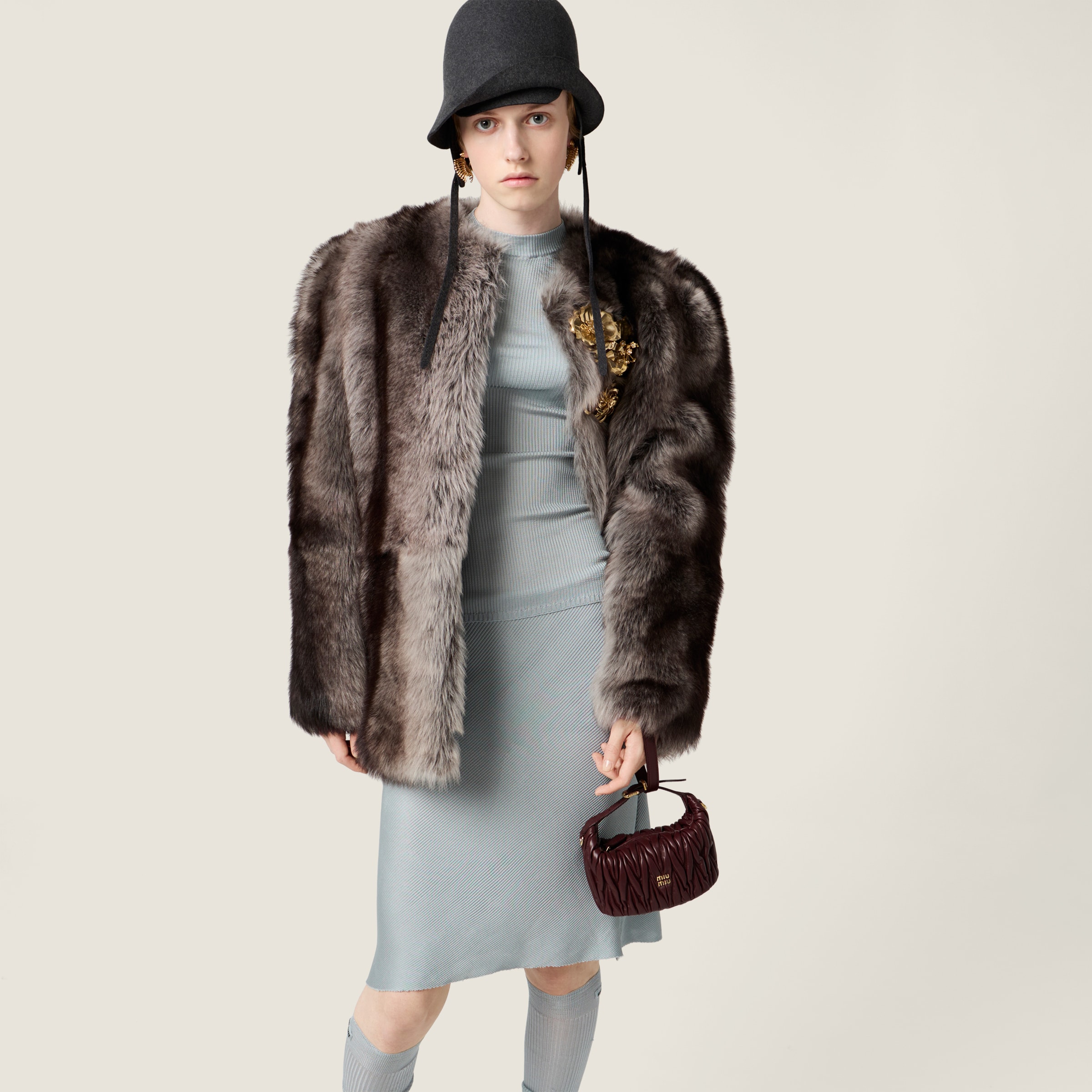 Miu Miu Matelassé Nappa Leather Pouch In Burgundy