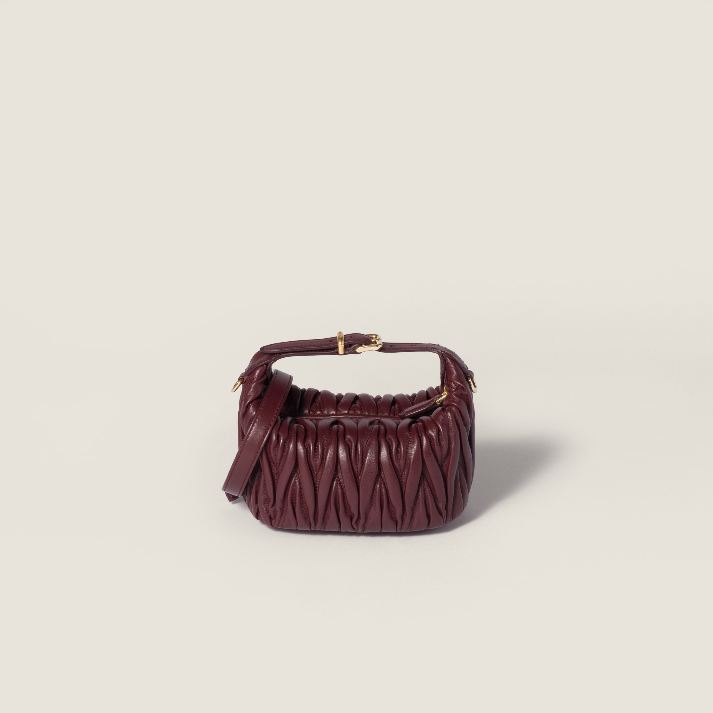 Miu Miu Matelassé Nappa Leather Pouch In Burgundy