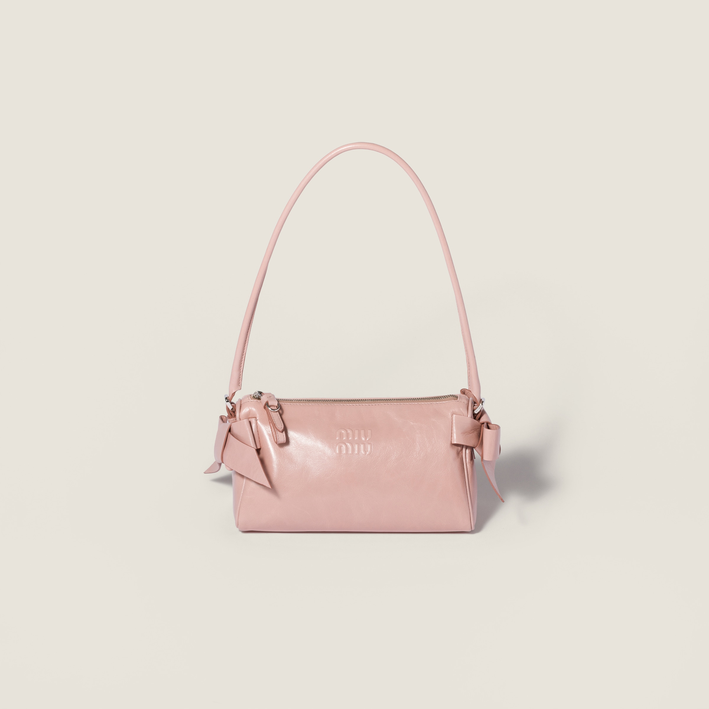 Shiny leather pouch from Miu Miu - $1,690