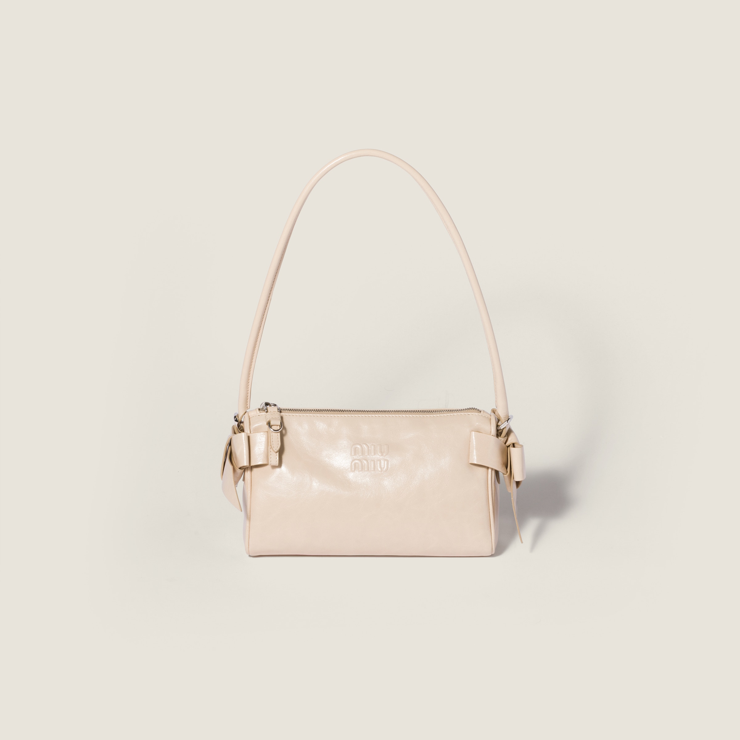 Shiny leather pouch from Miu Miu - $1,690