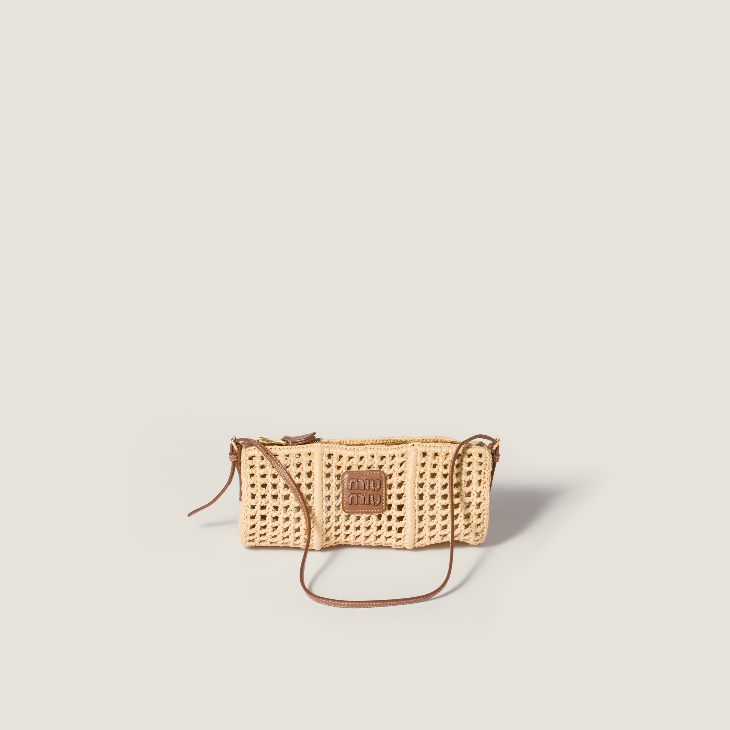 Crochet mesh pouch from Miu Miu - $1,470