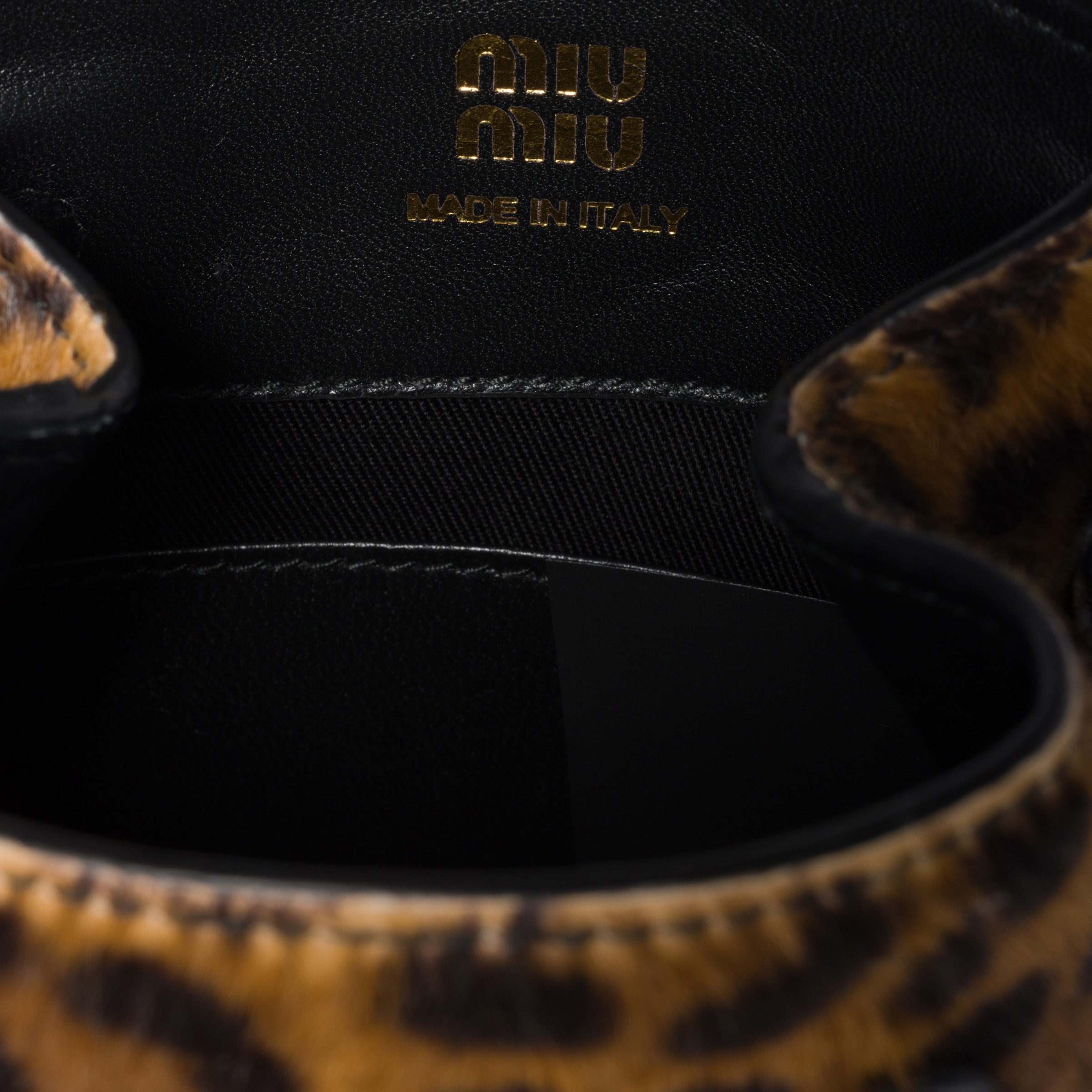 Miu Miu Calf Hair Pouch In Brown