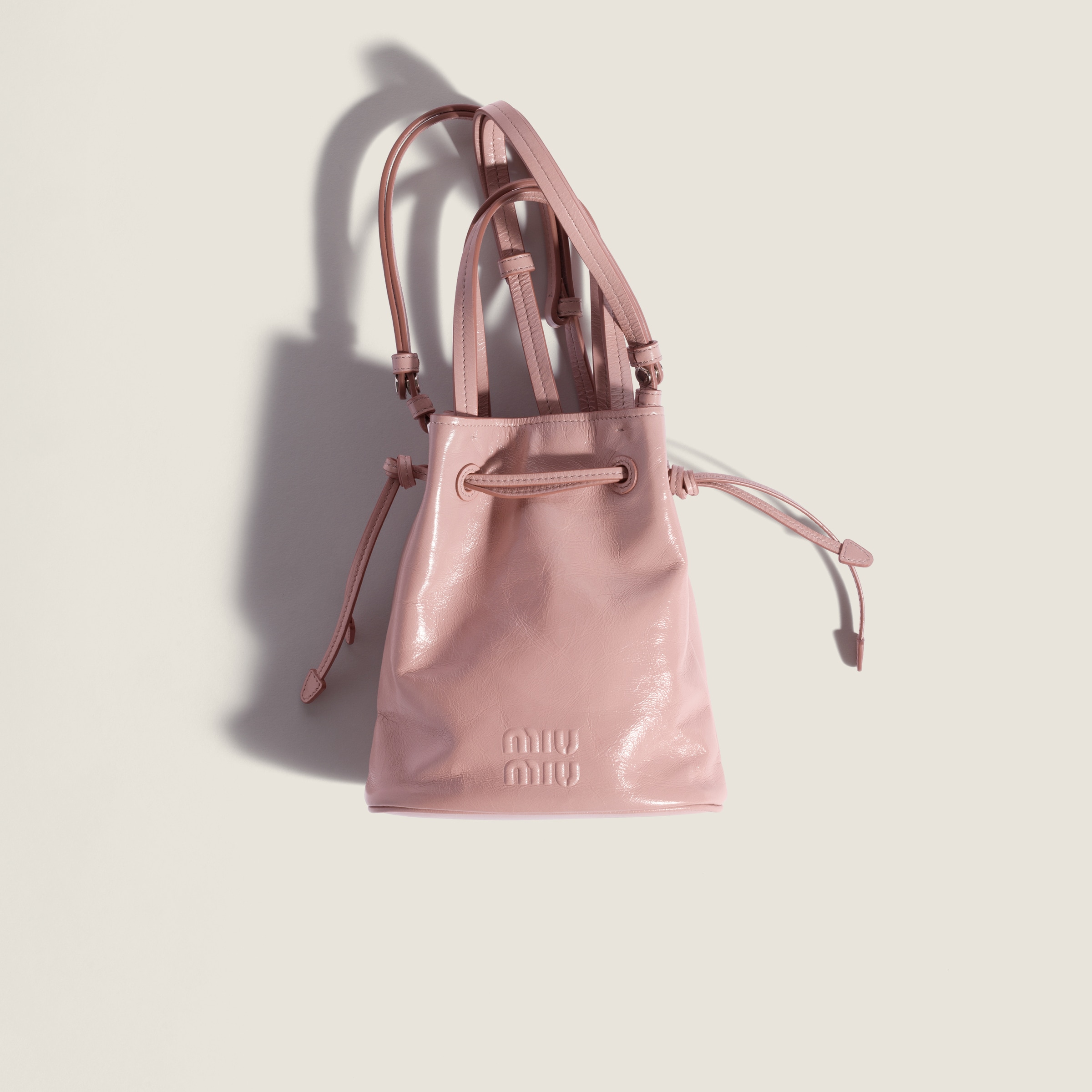 Shiny leather pouch by Miu Miu