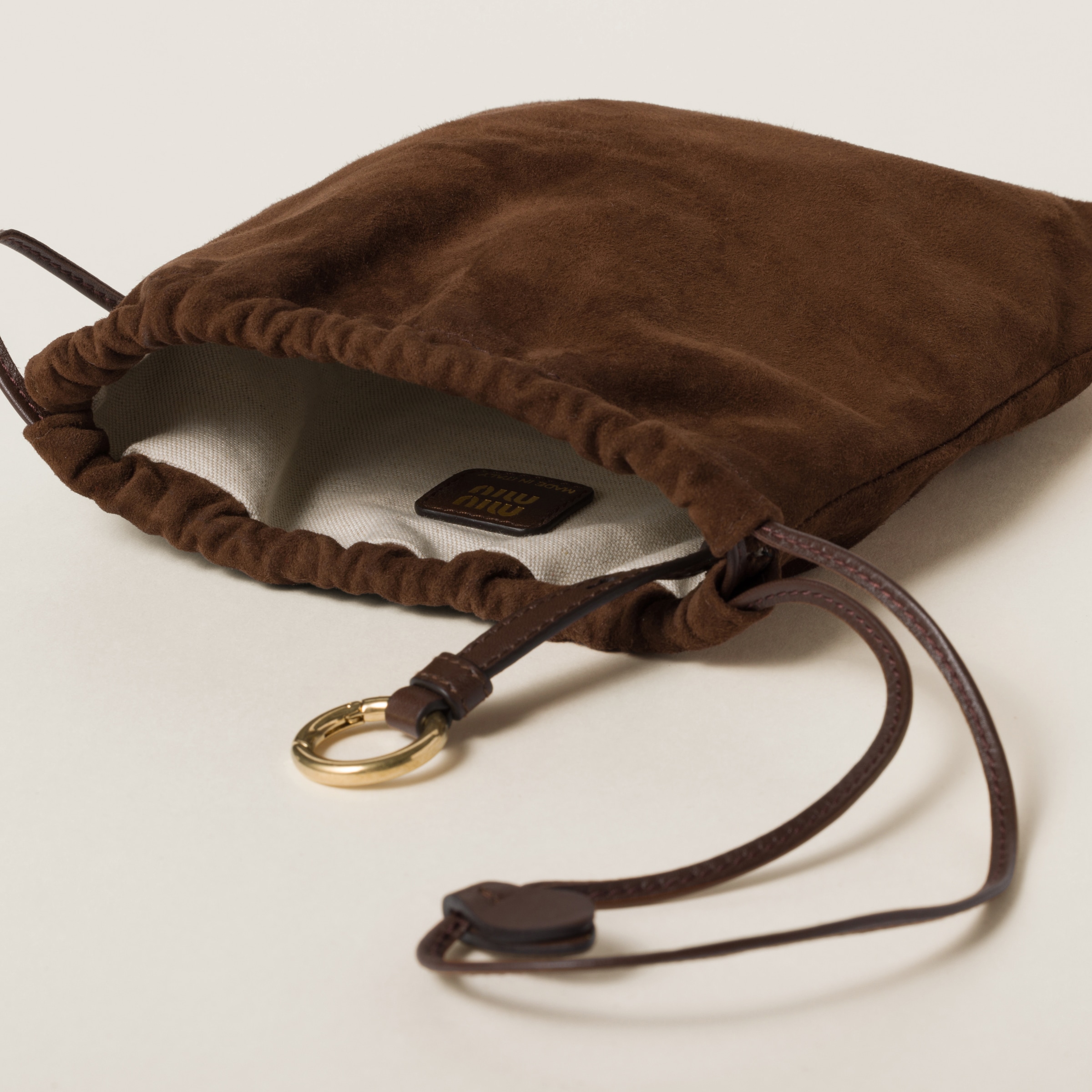 Suede pouch bag on sale