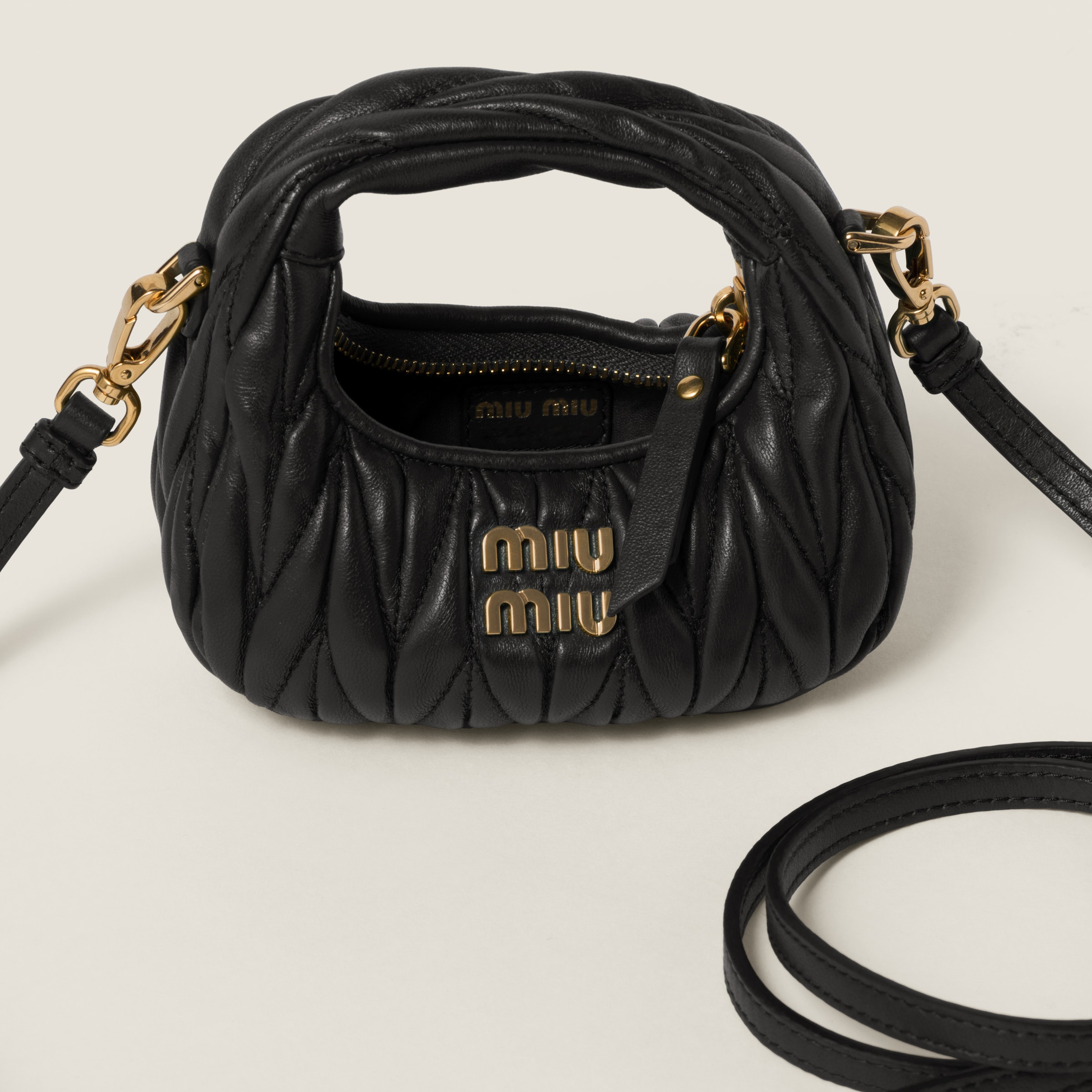 Black Wander Matelassé Nappa Leather Micro Hobo Bag | Miu Miu