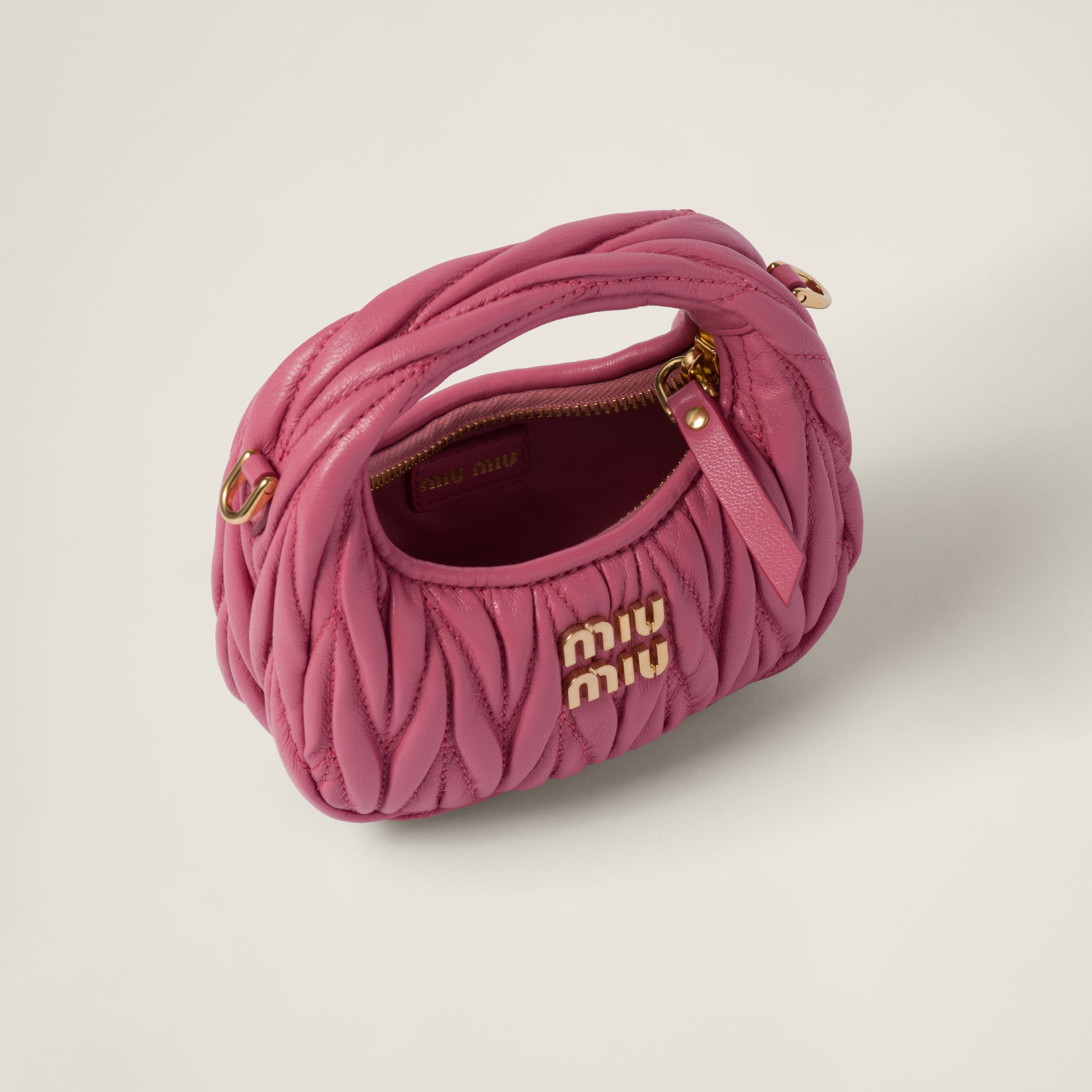 Shop Miumiu Wander Matelassé Nappa Leather Micro Hobo Bag In Begonia Pink