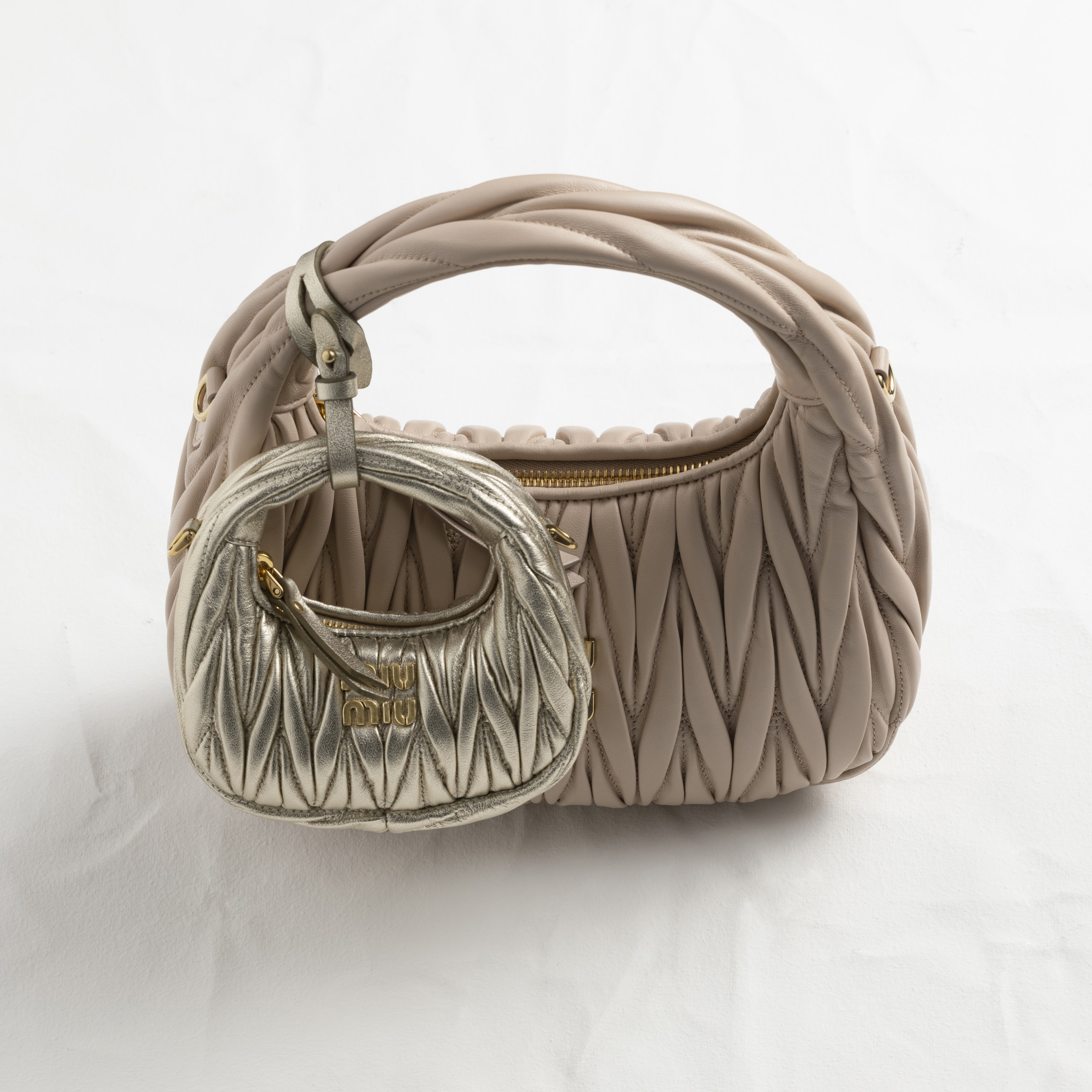 Pyrite Wander Matelassé Nappa Leather Micro Hobo Bag | Miu Miu