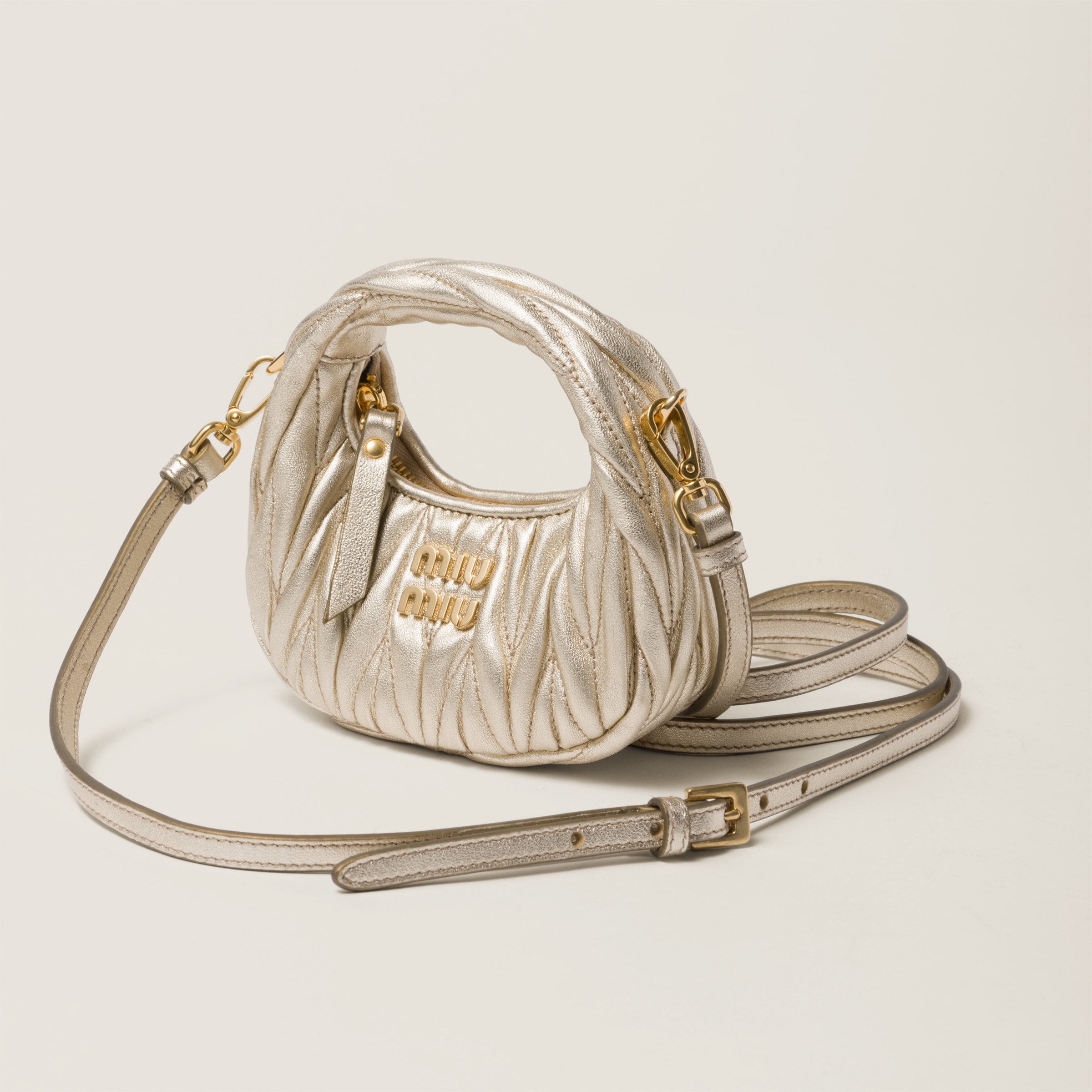 Pyrite Wander Matelassé Nappa Leather Micro Hobo Bag | Miu Miu