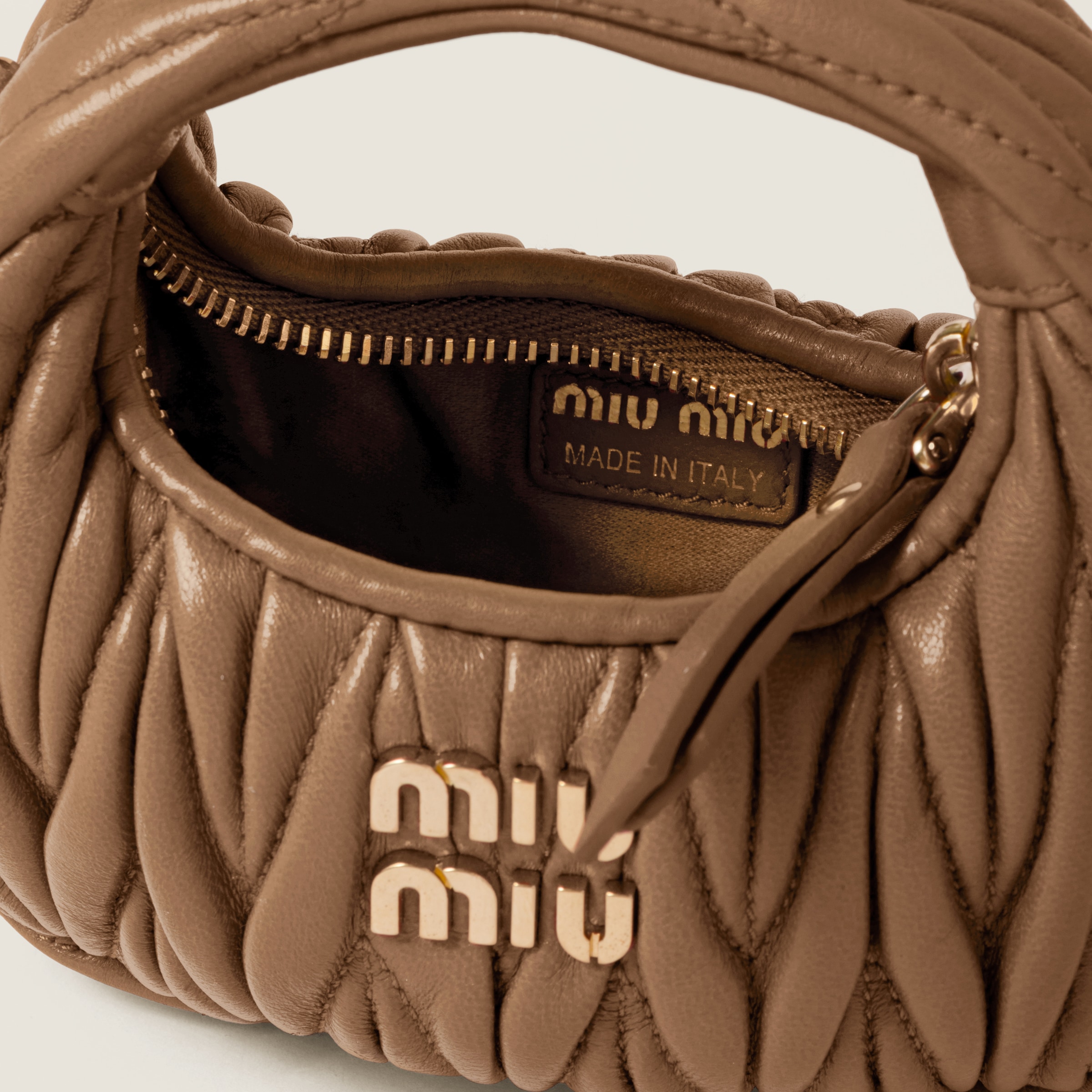 Miu Miu Wander Matelassé Nappa Leather Micro Hobo Bag In Caramel