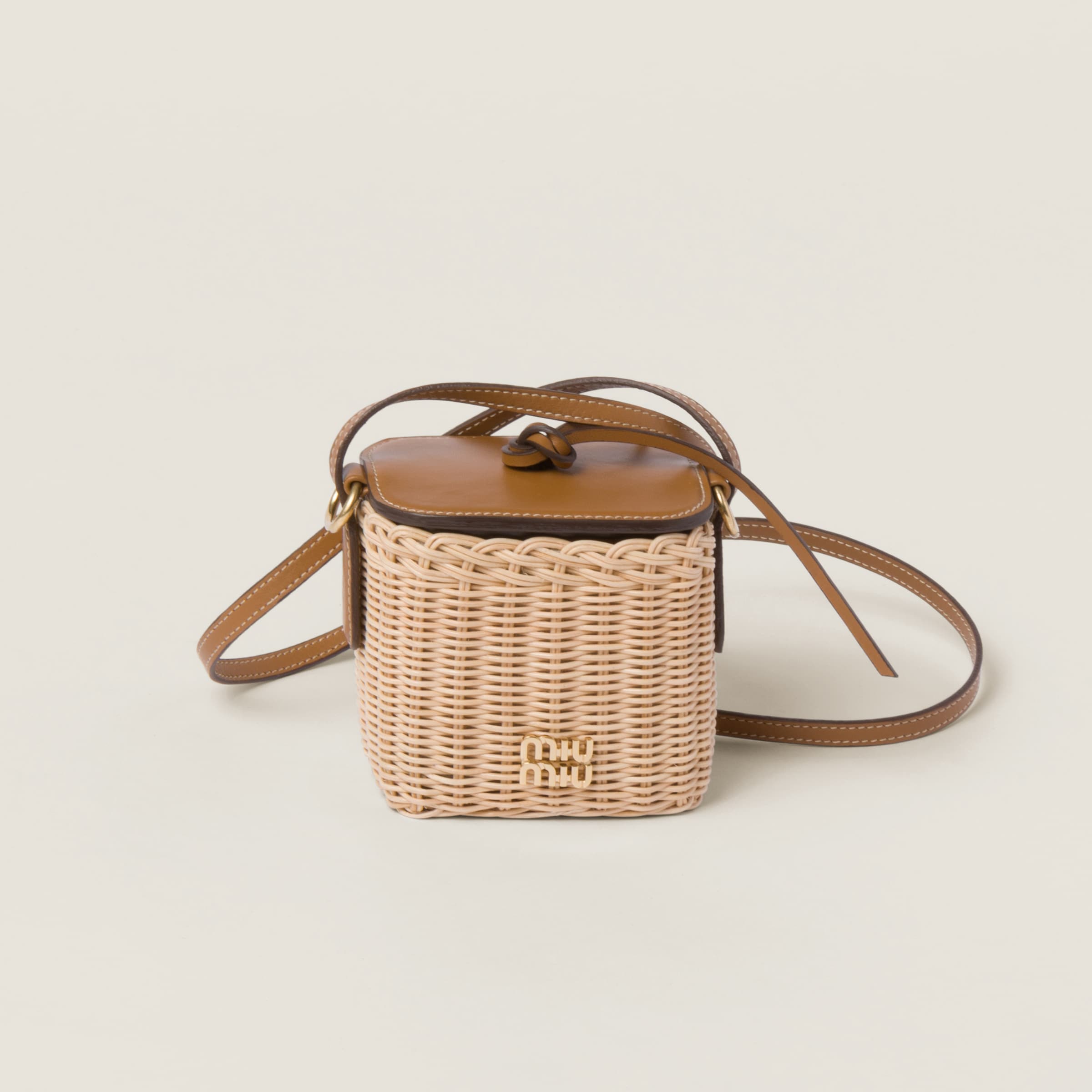 Woven fabric and leather micro bag