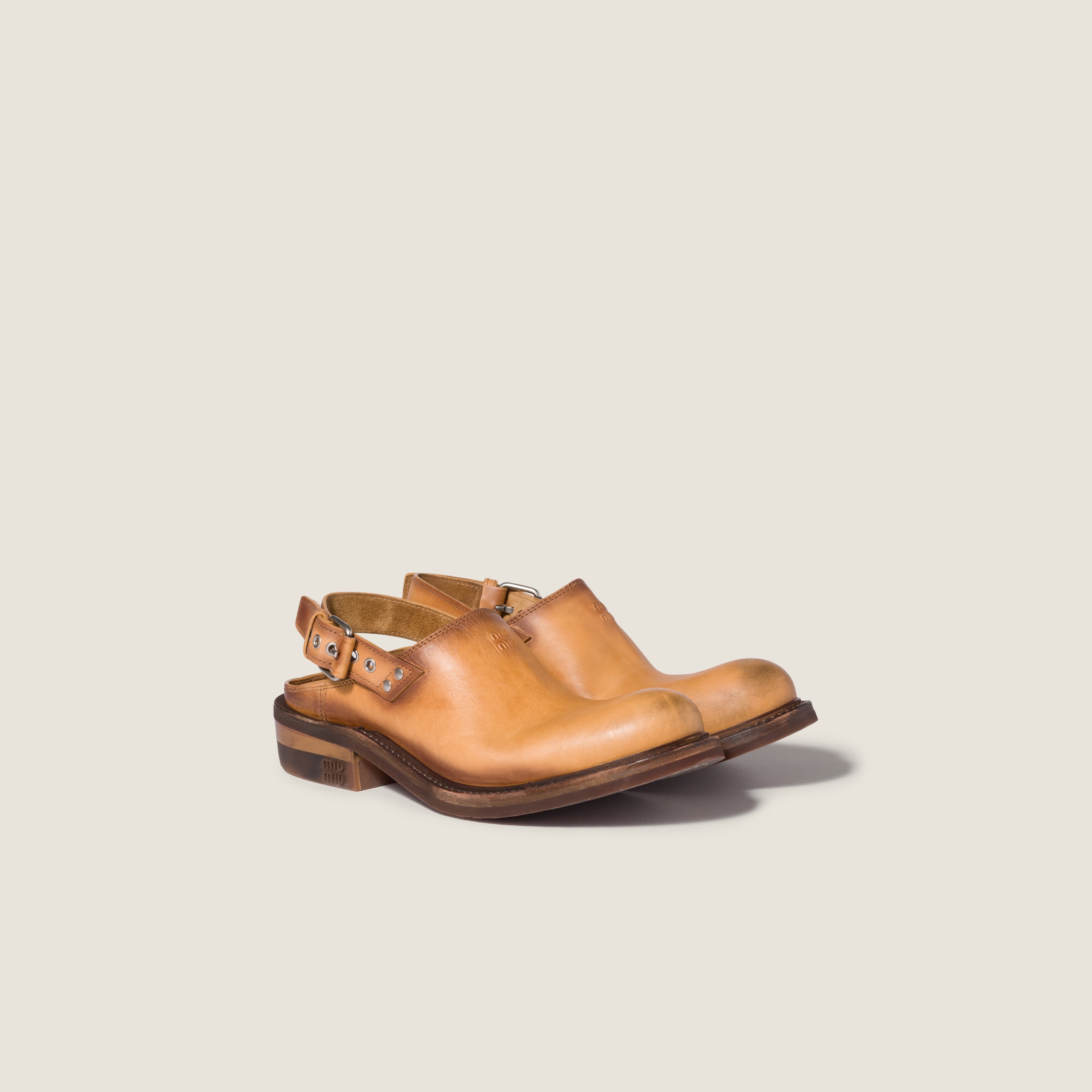 Leather mules with buckle