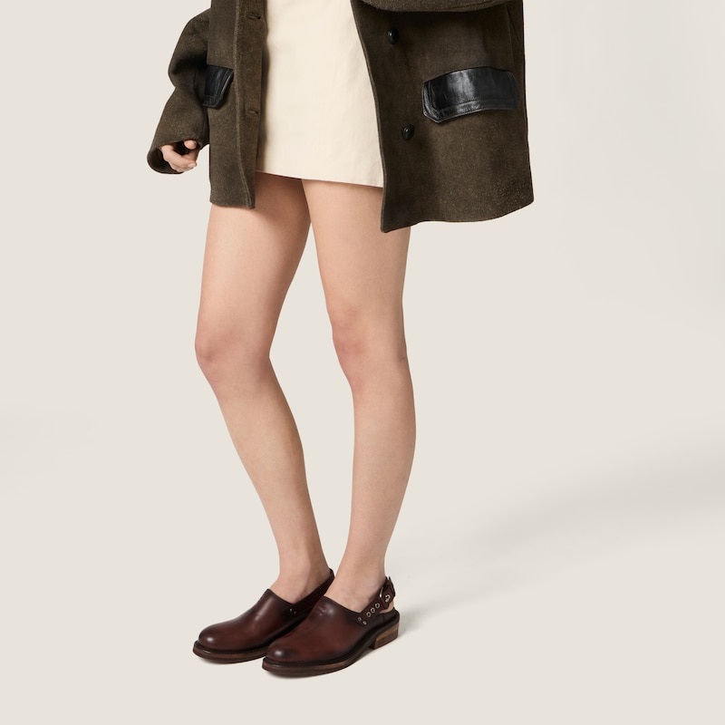 Leather mules with buckle