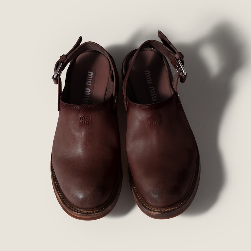 Leather mules with buckle