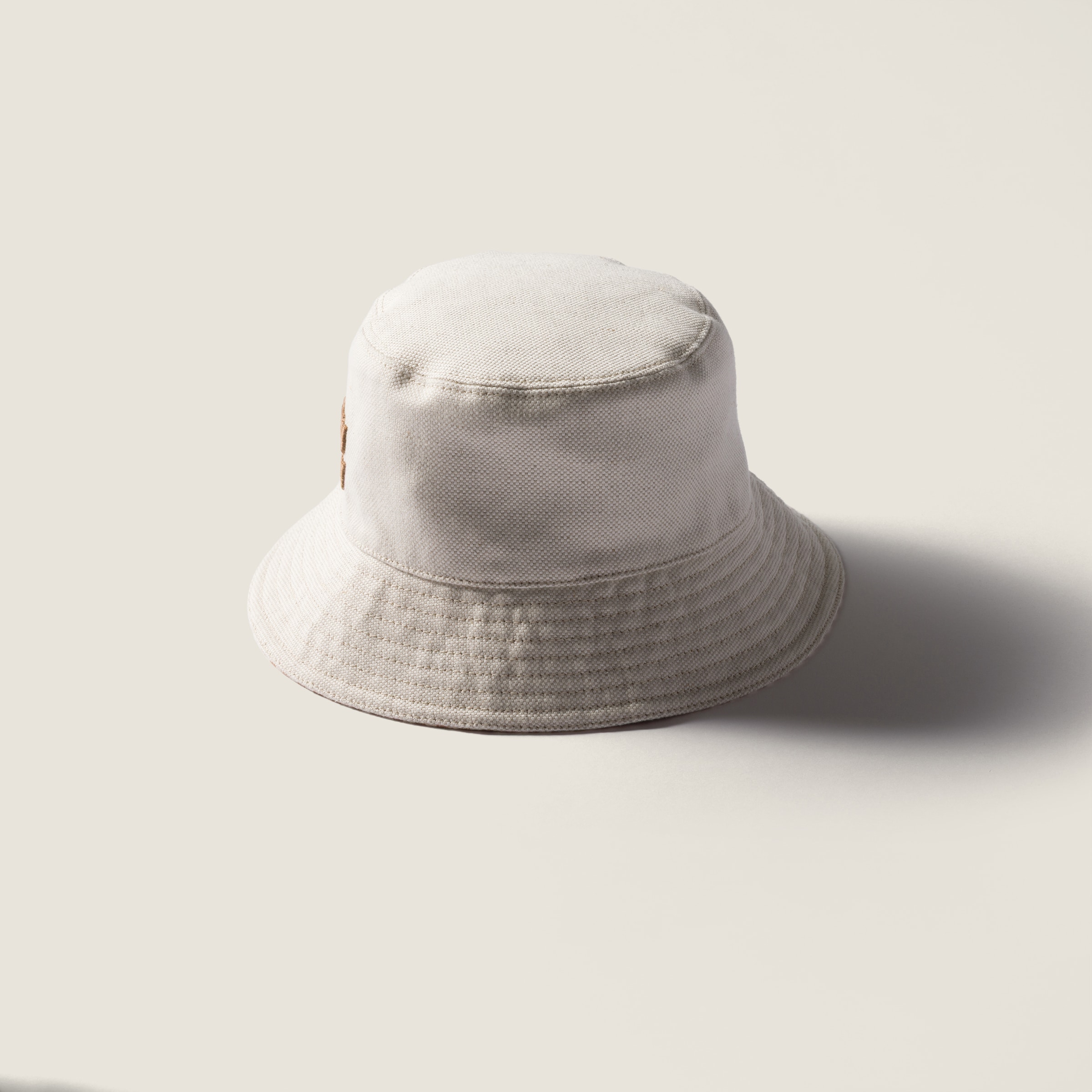 Miu Miu Reversible Hat With Pouch In Brown