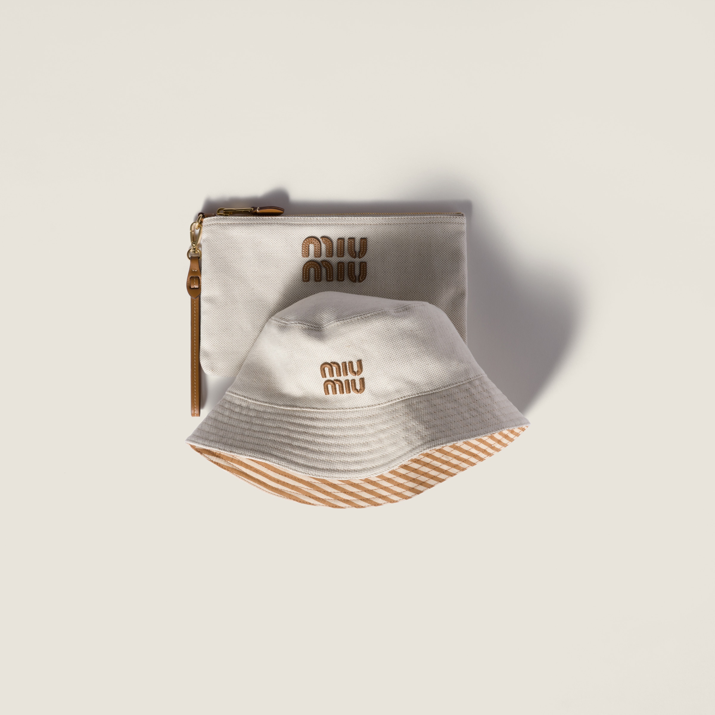 Miu Miu Reversible Hat With Pouch In Brown