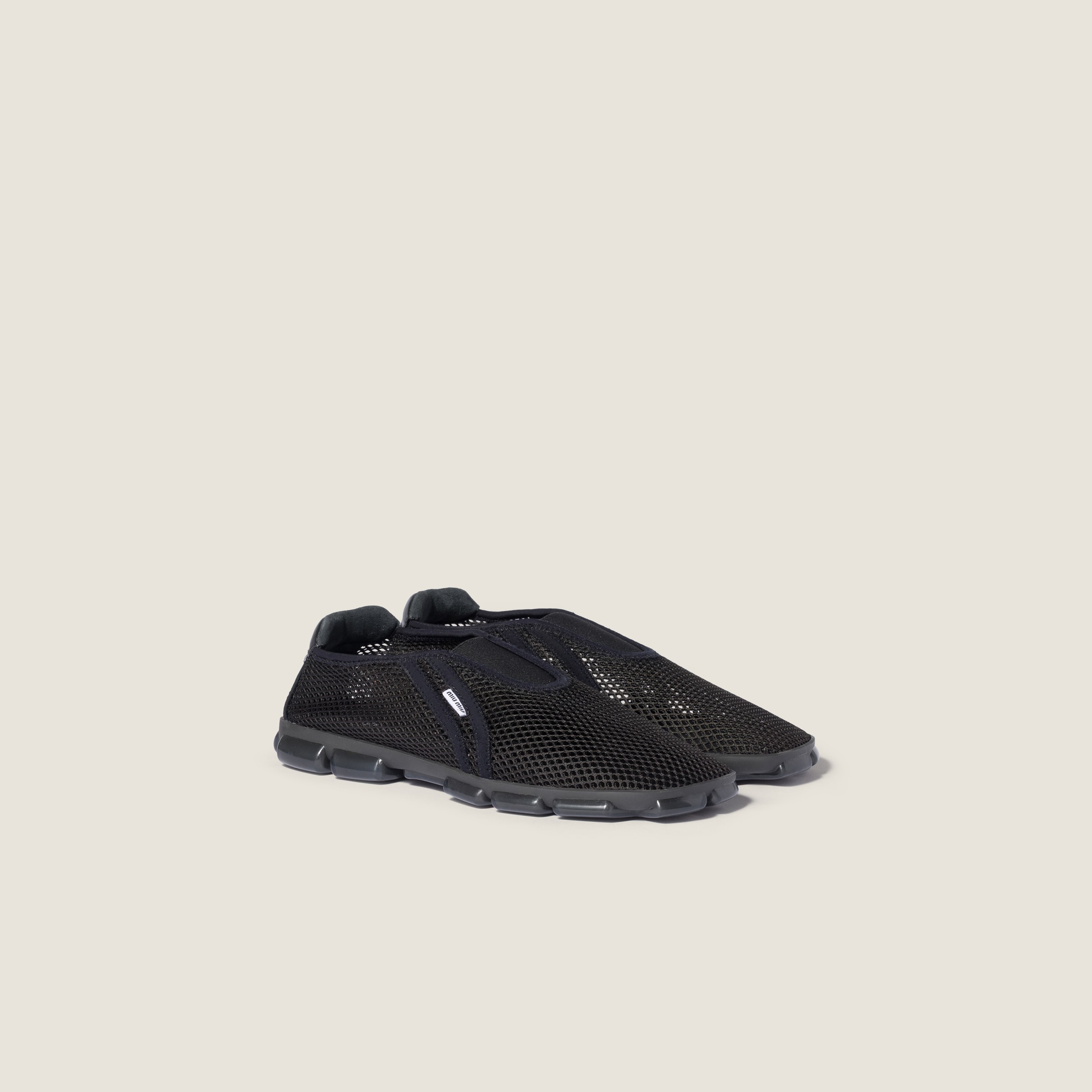 Technical mesh fabric sneakers from Miu Miu - $975