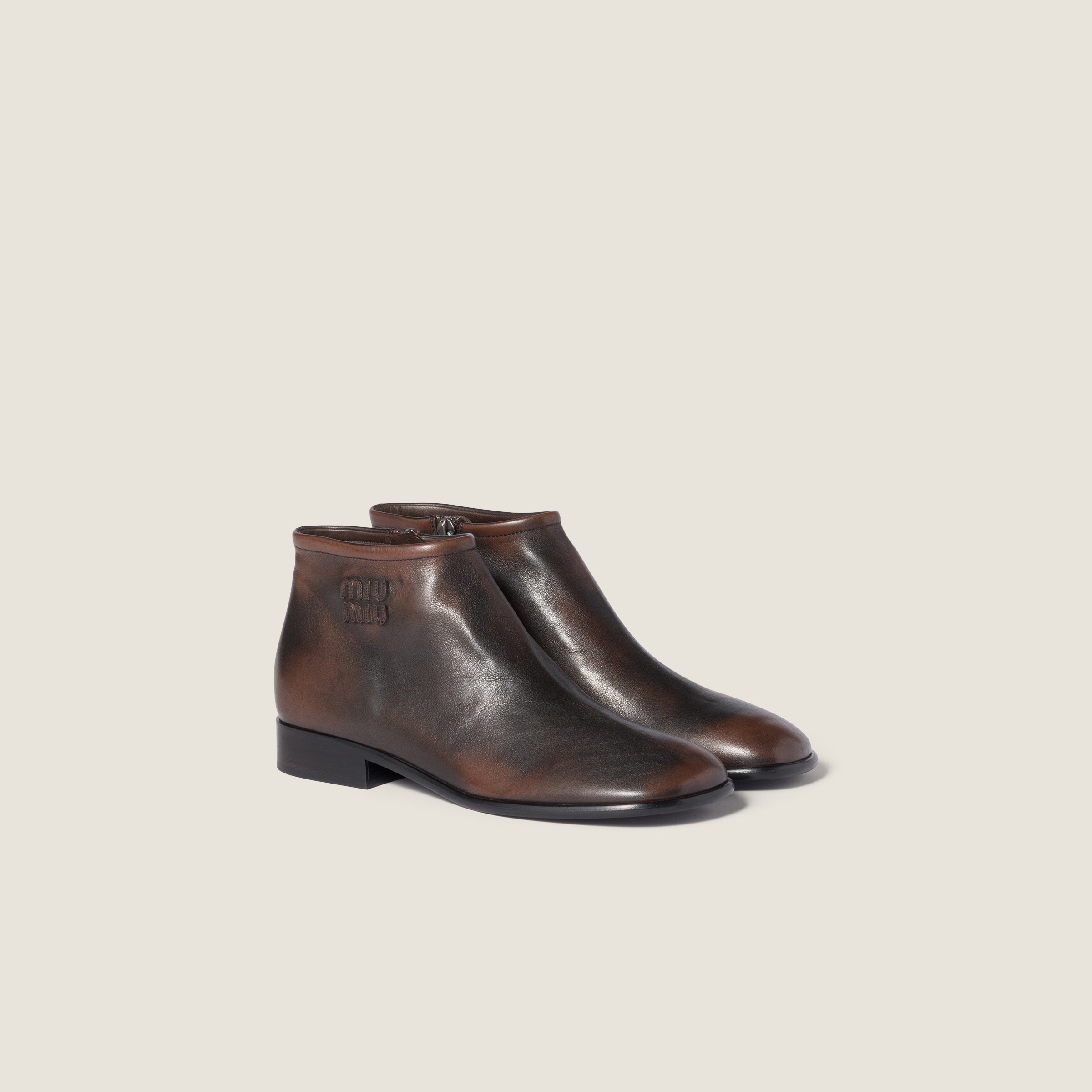 Miu Miu Fumé Leather Booties In Animal Print
