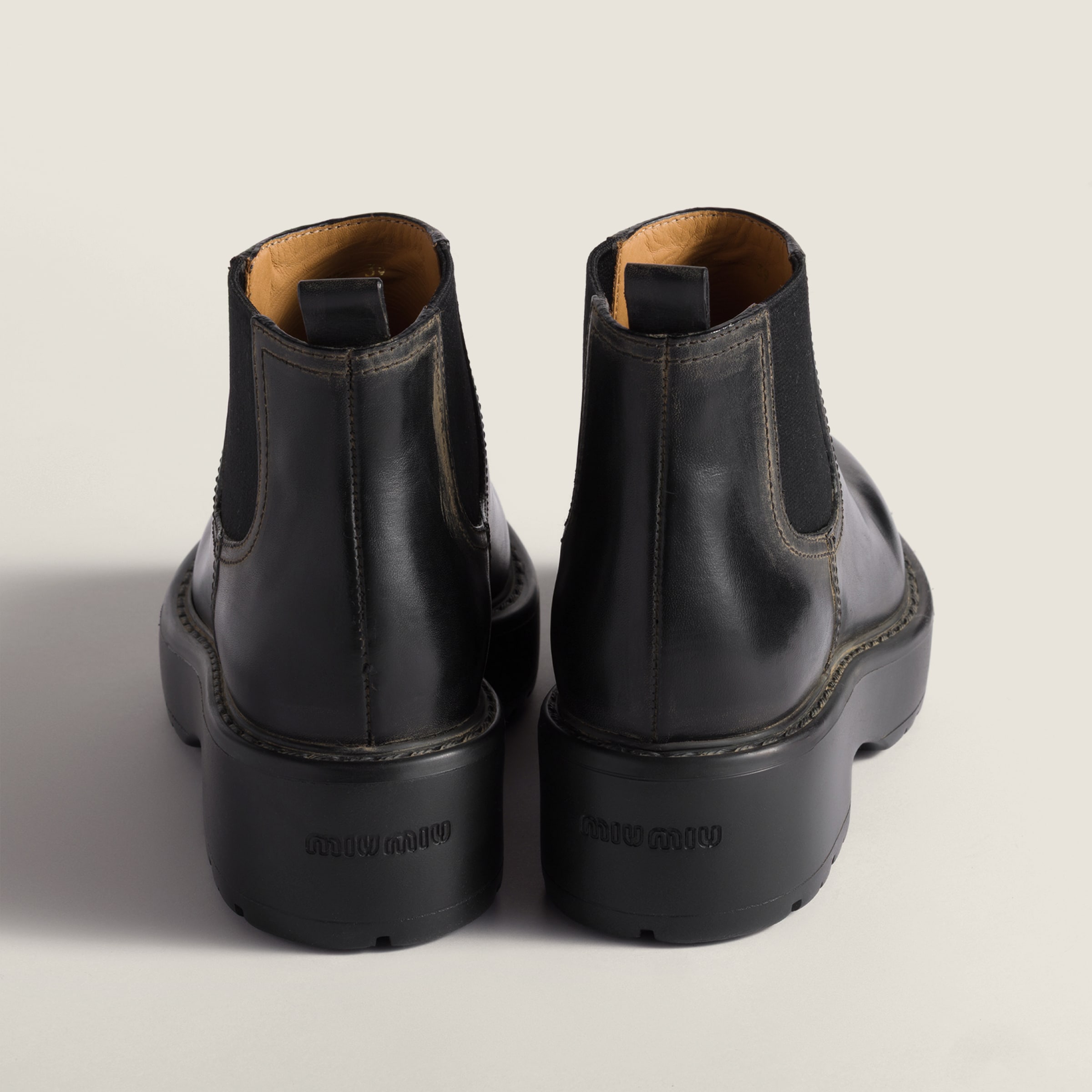 Miu Miu Ankle Boots With Chunky Sole And Pull Tab In Animal Print
