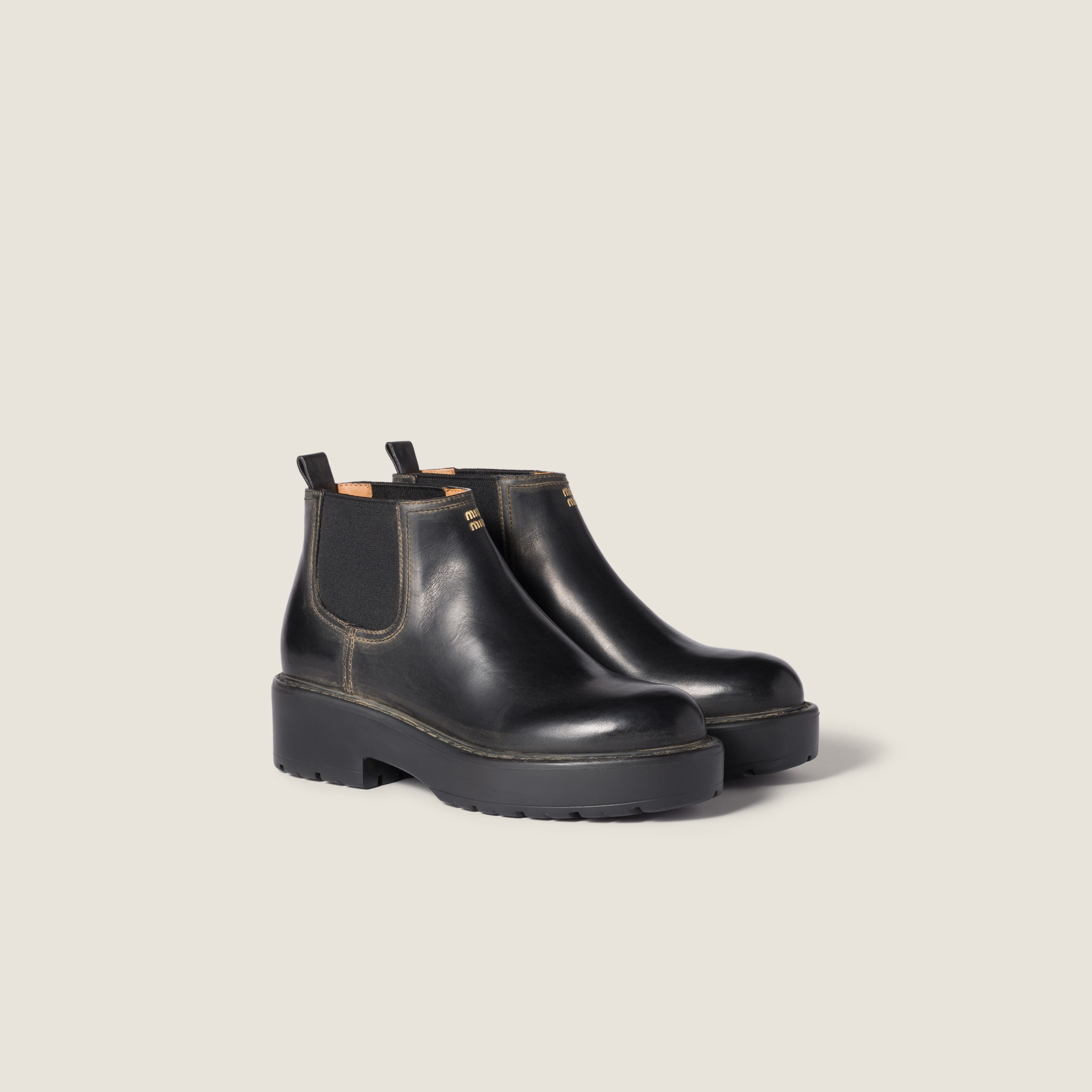 Miu Miu Ankle Boots With Chunky Sole And Pull Tab In Animal Print