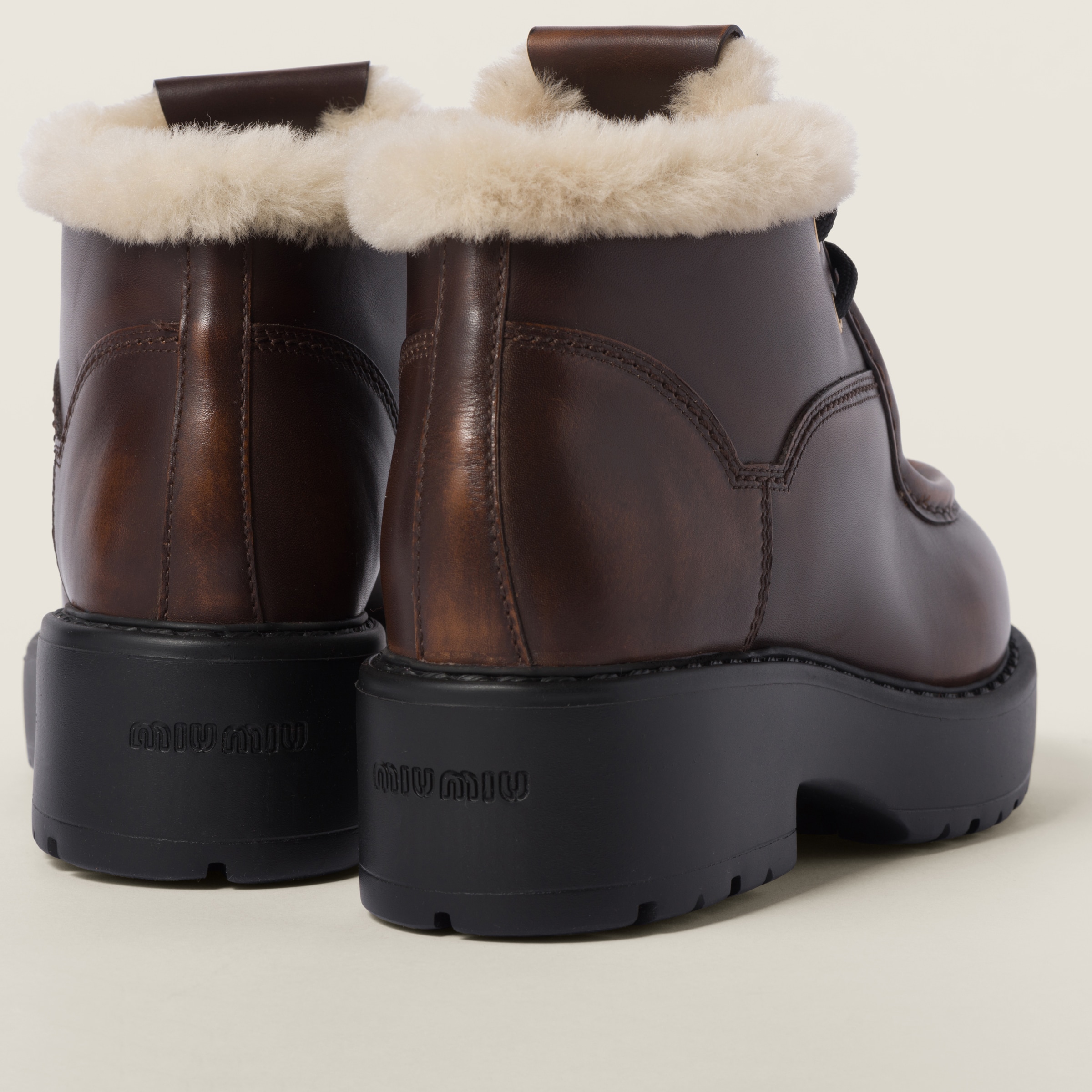 Sienna Fumé Leather Booties | Miu Miu