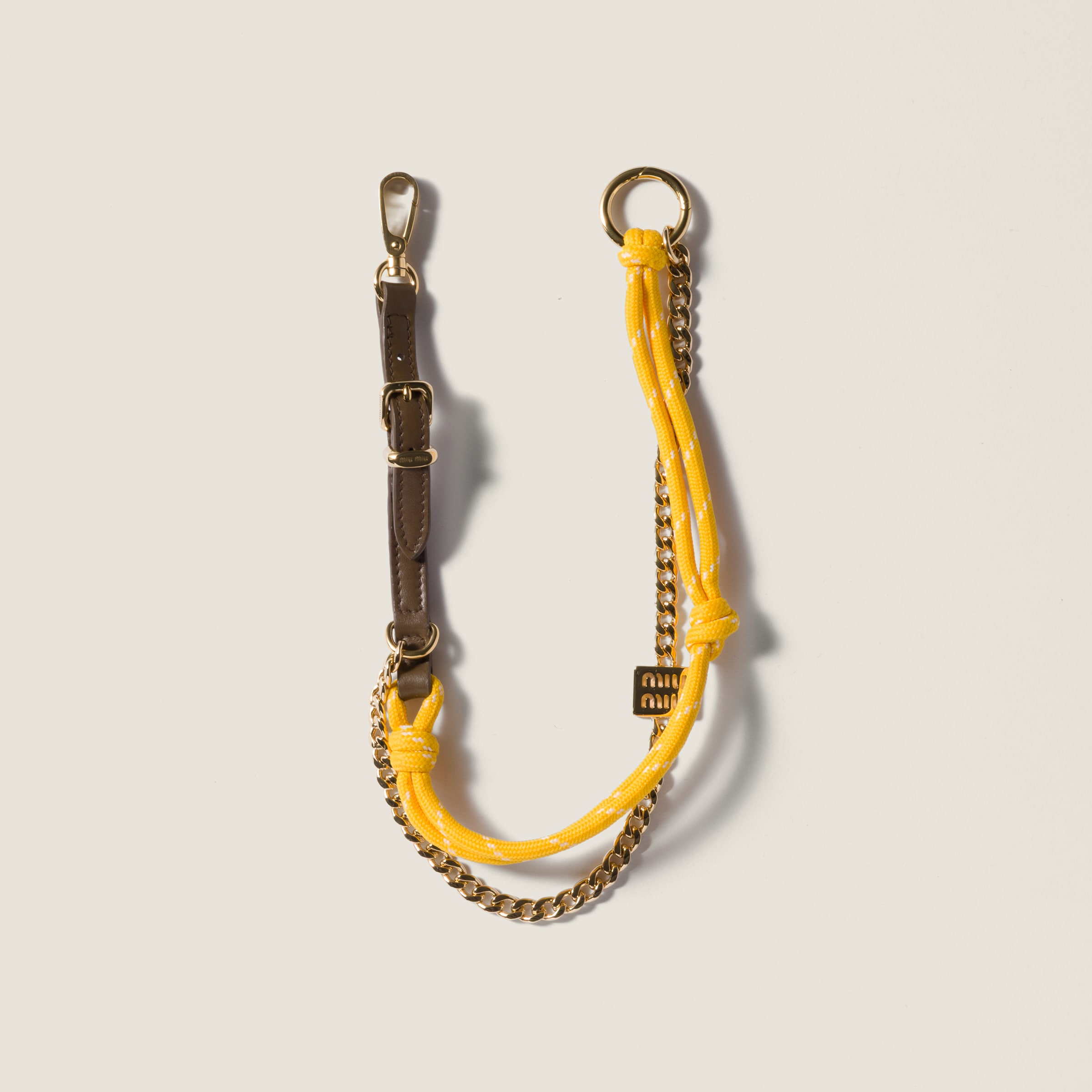 Leather, cord and metal trick keyring