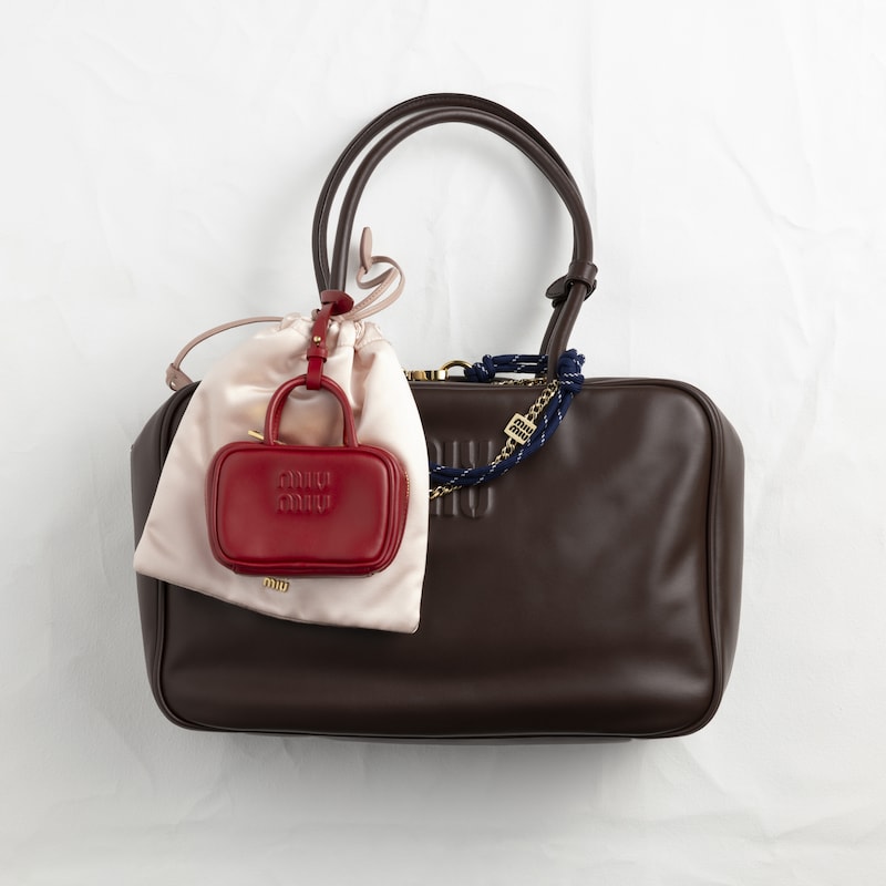 Leather, cord and metal trick keyring