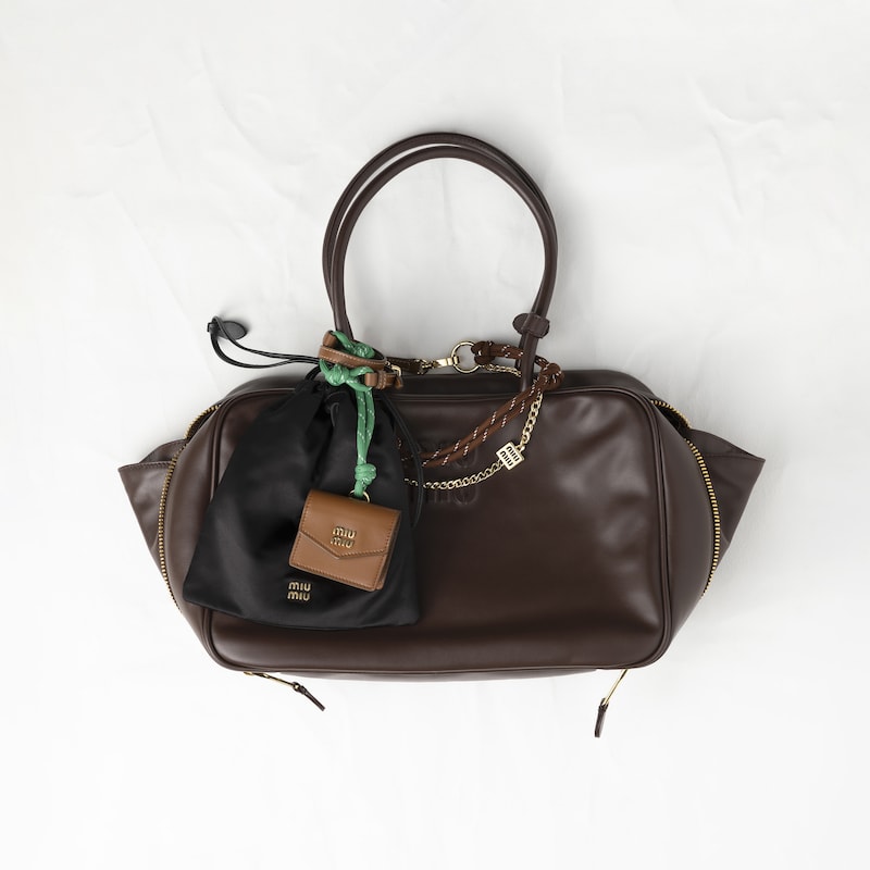 Leather, cord and metal trick keyring