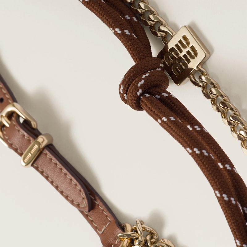 Leather, cord and metal trick keyring