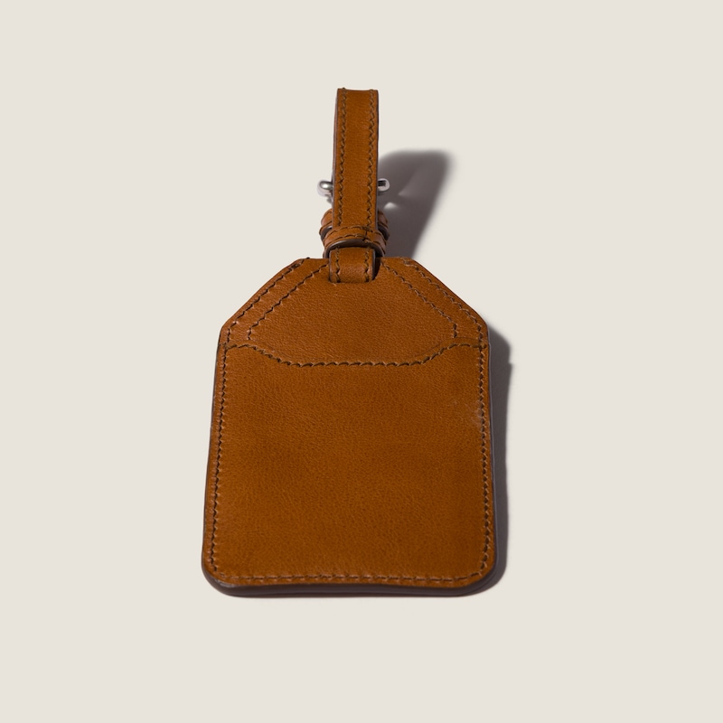 Leather name tag trick