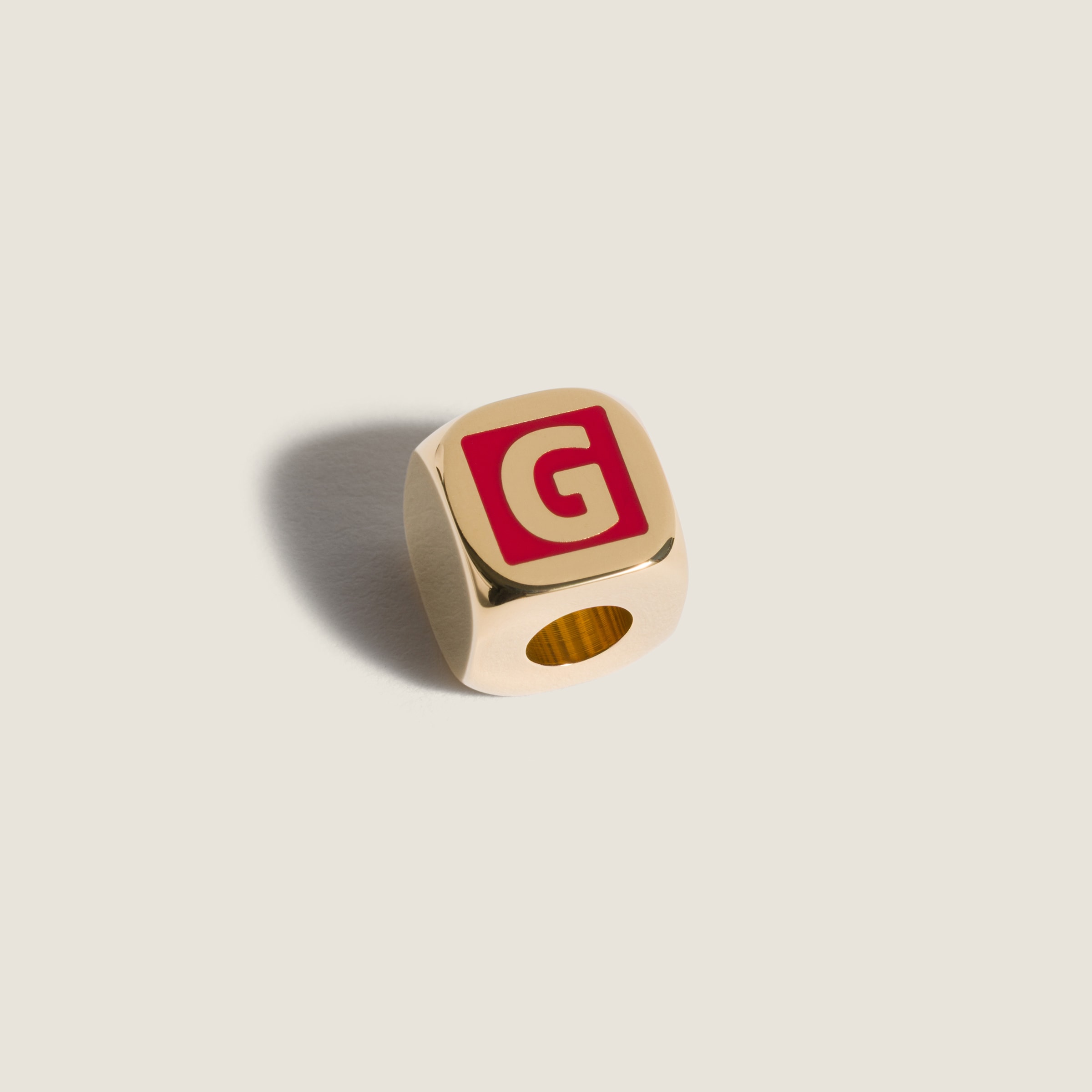 Enameled metal dice charm
