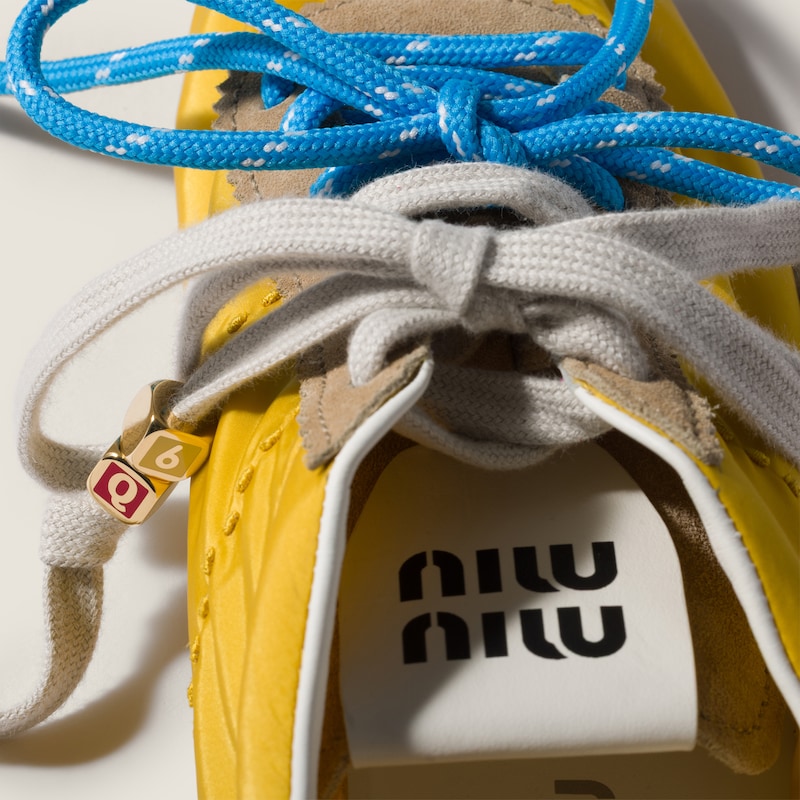 Enameled metal dice charm