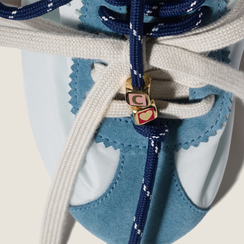 Enameled metal dice charm with heart