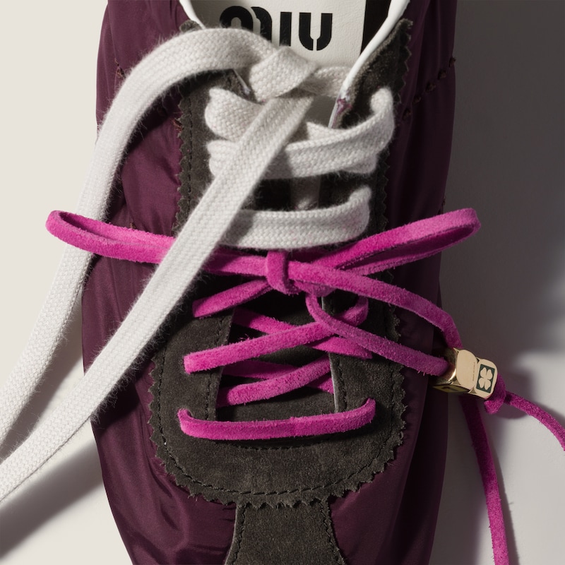 Enameled metal dice charm with four-leaf clover