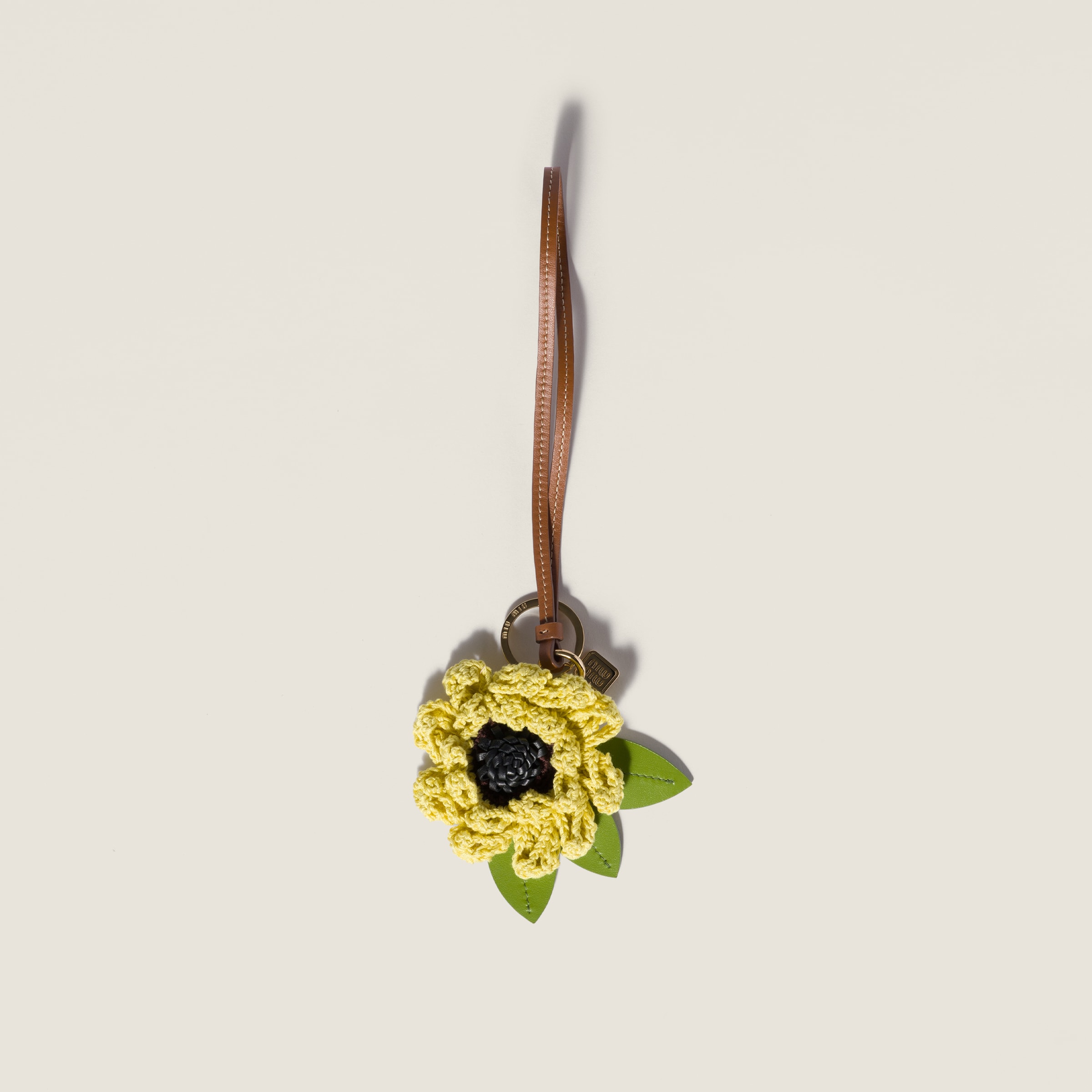 Fabric and leather key ring trick from Miu Miu - $625