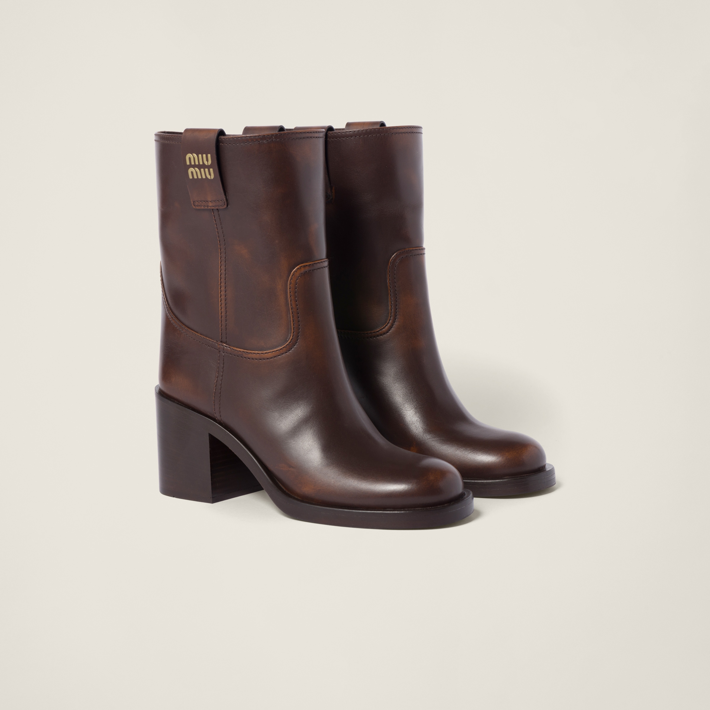 Miu Miu Fumé Leather Booties In Sienna