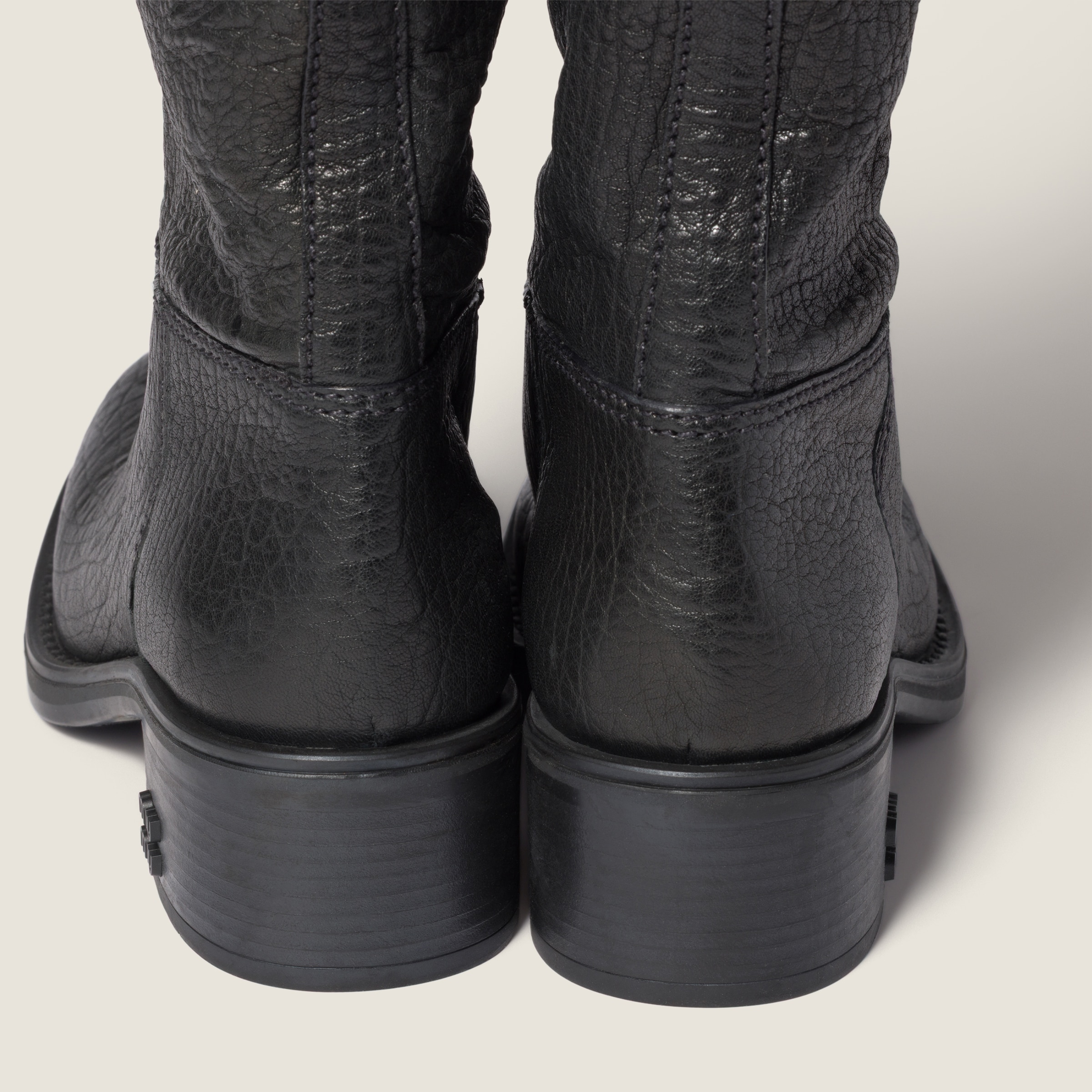 Miu Miu Logo-embossed Leather Boots In Black