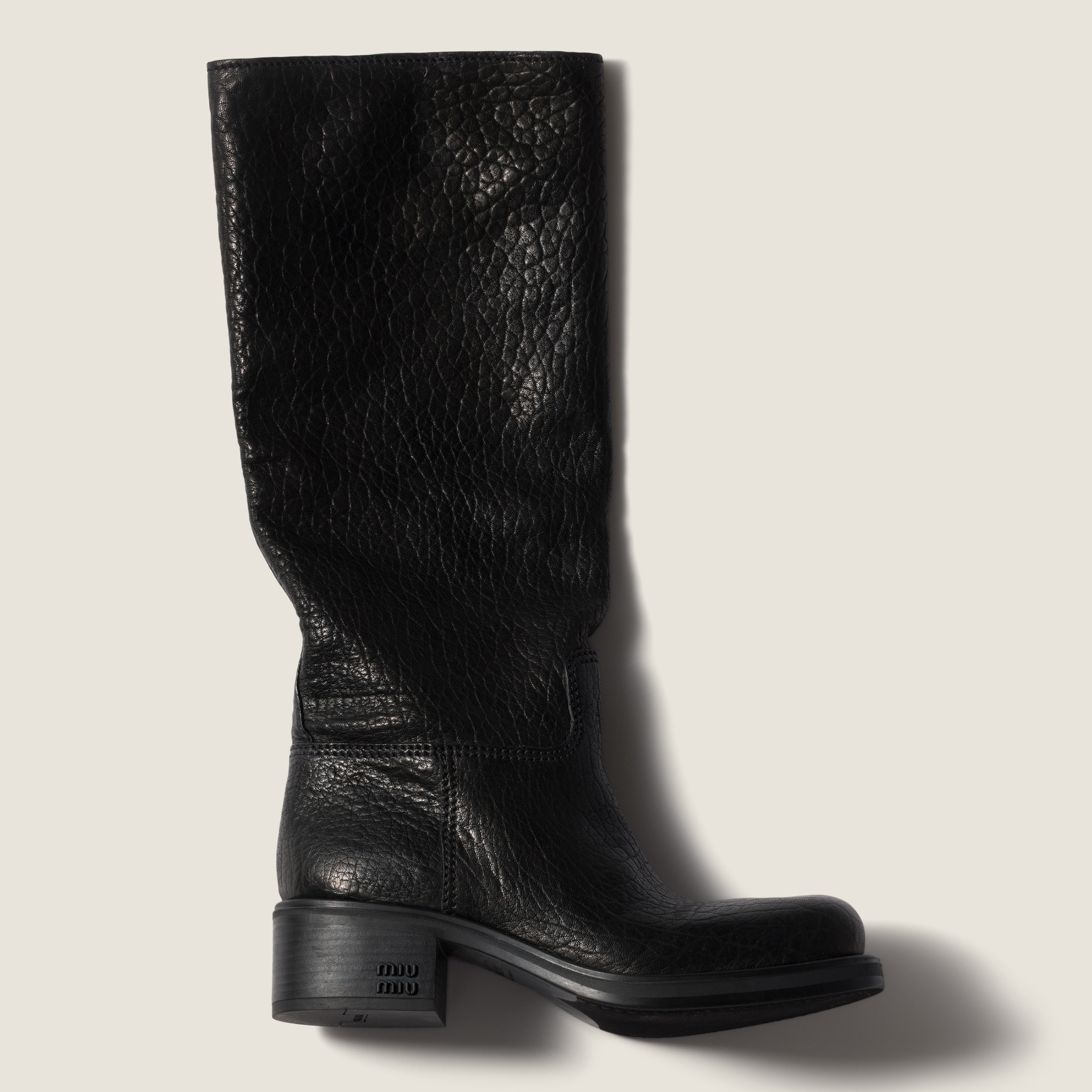 Miu Miu Logo-embossed Leather Boots In Black