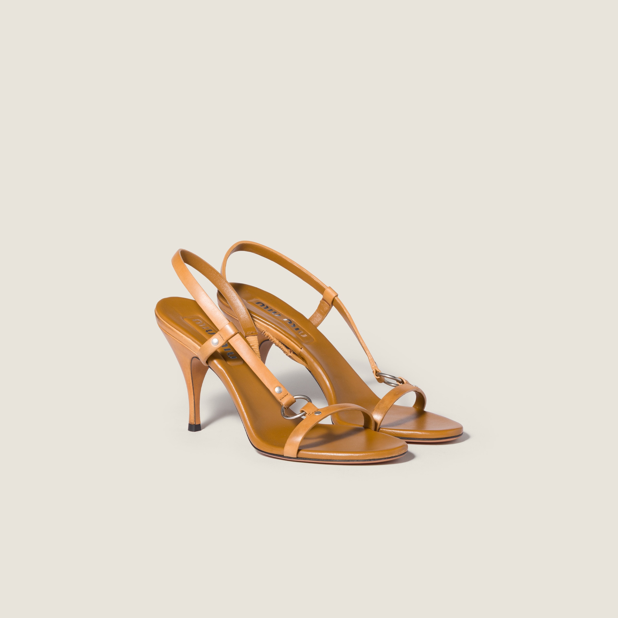 Leather sandals from Miu Miu - $1,200