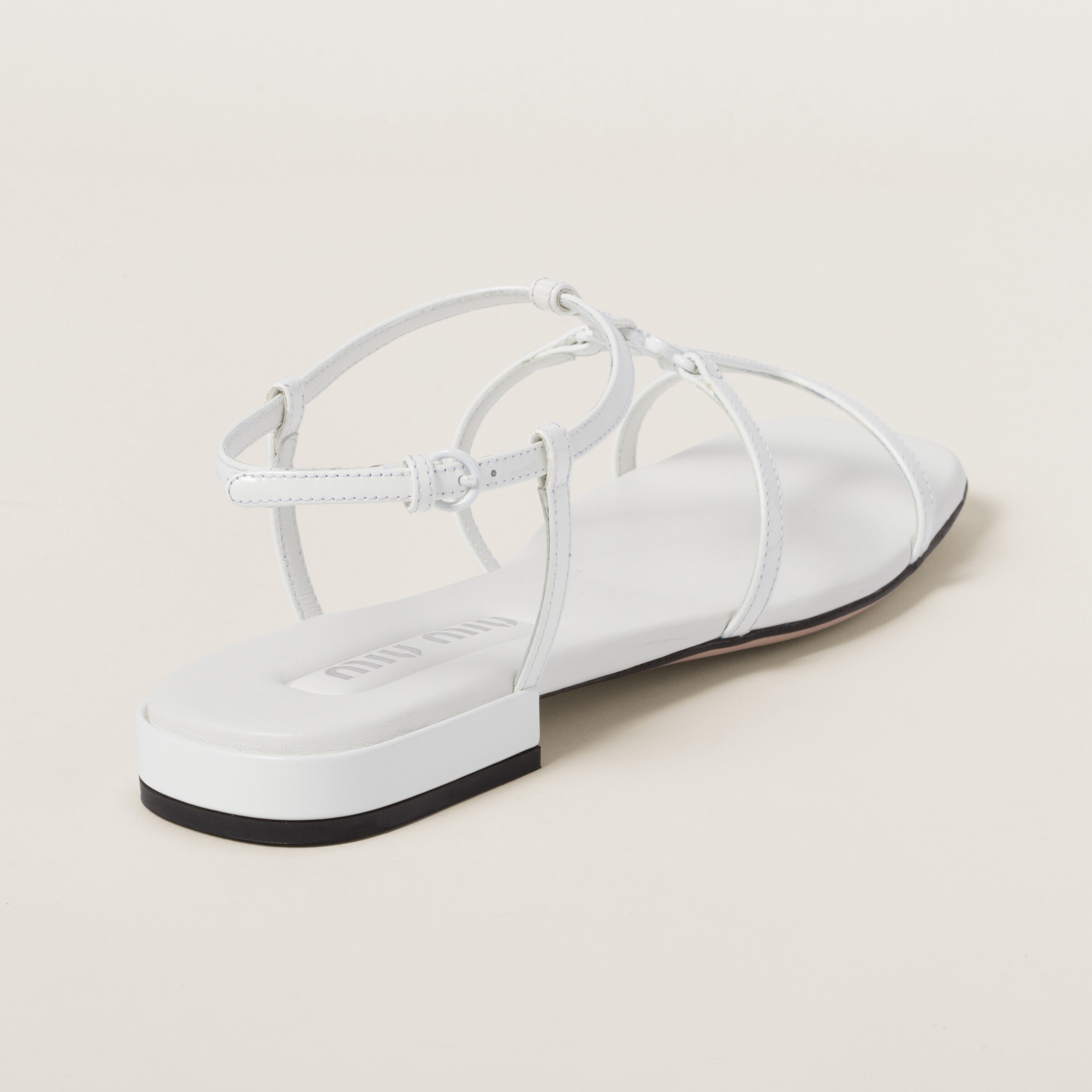 White patent best sale leather flip flops