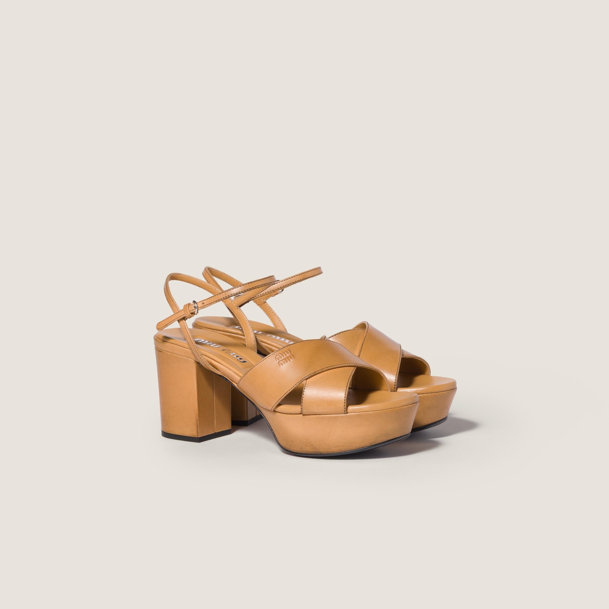Leather platform sandals from Miu Miu - $1,450