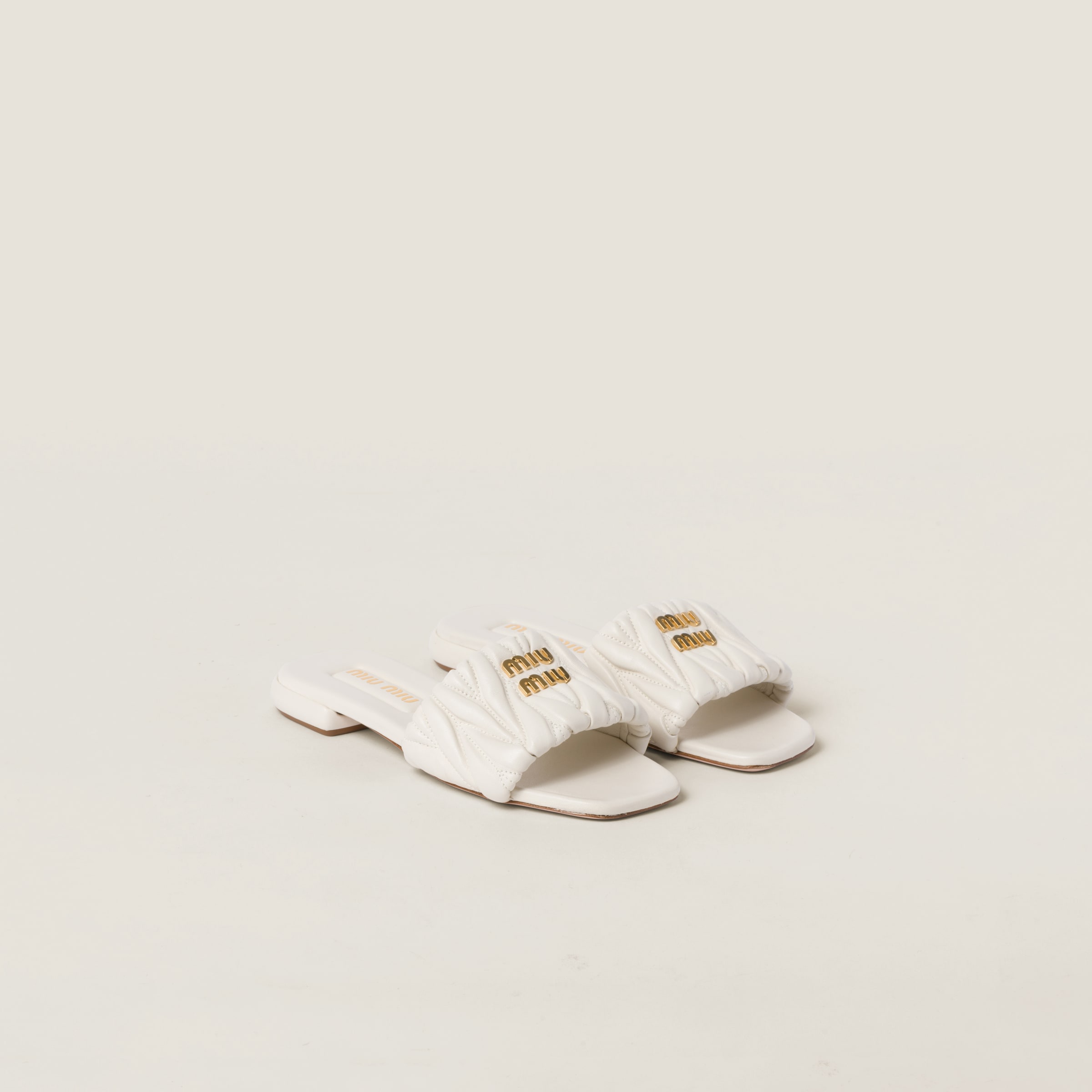 Miumiu Matelassé Nappa Leather Slides In White